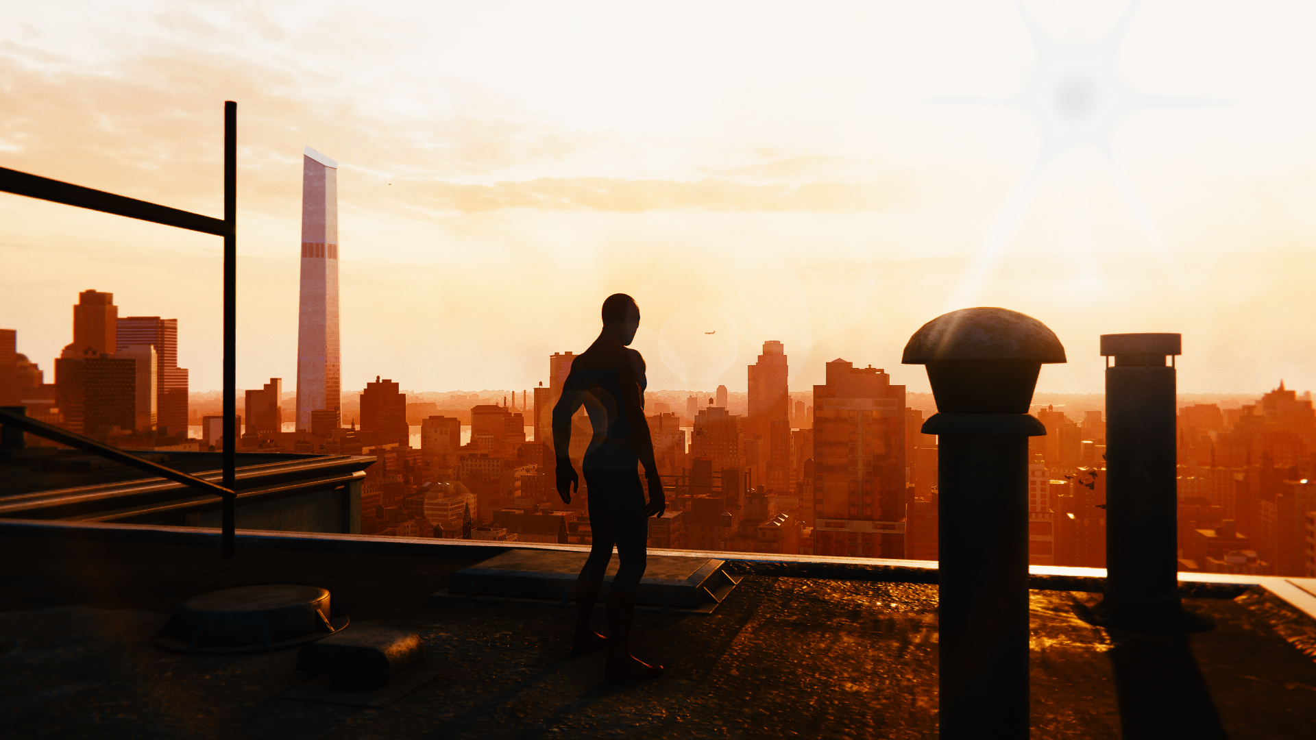 Spider-Man on a rooftop overlooking a city at sunset HD Wallpaper
