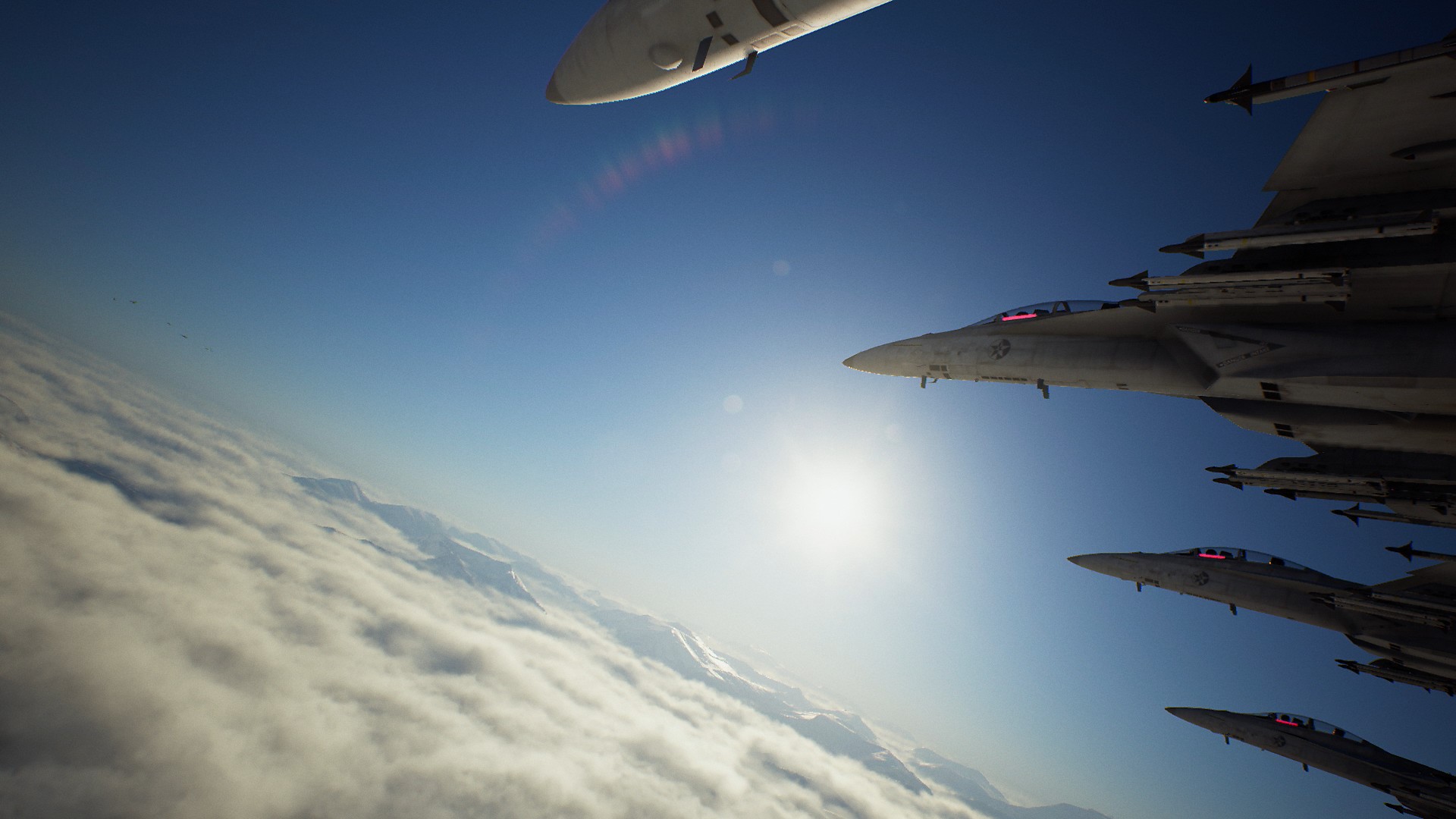 Fighter jets flying over clouds and mountains in Ace Combat 7 HD Wallpaper