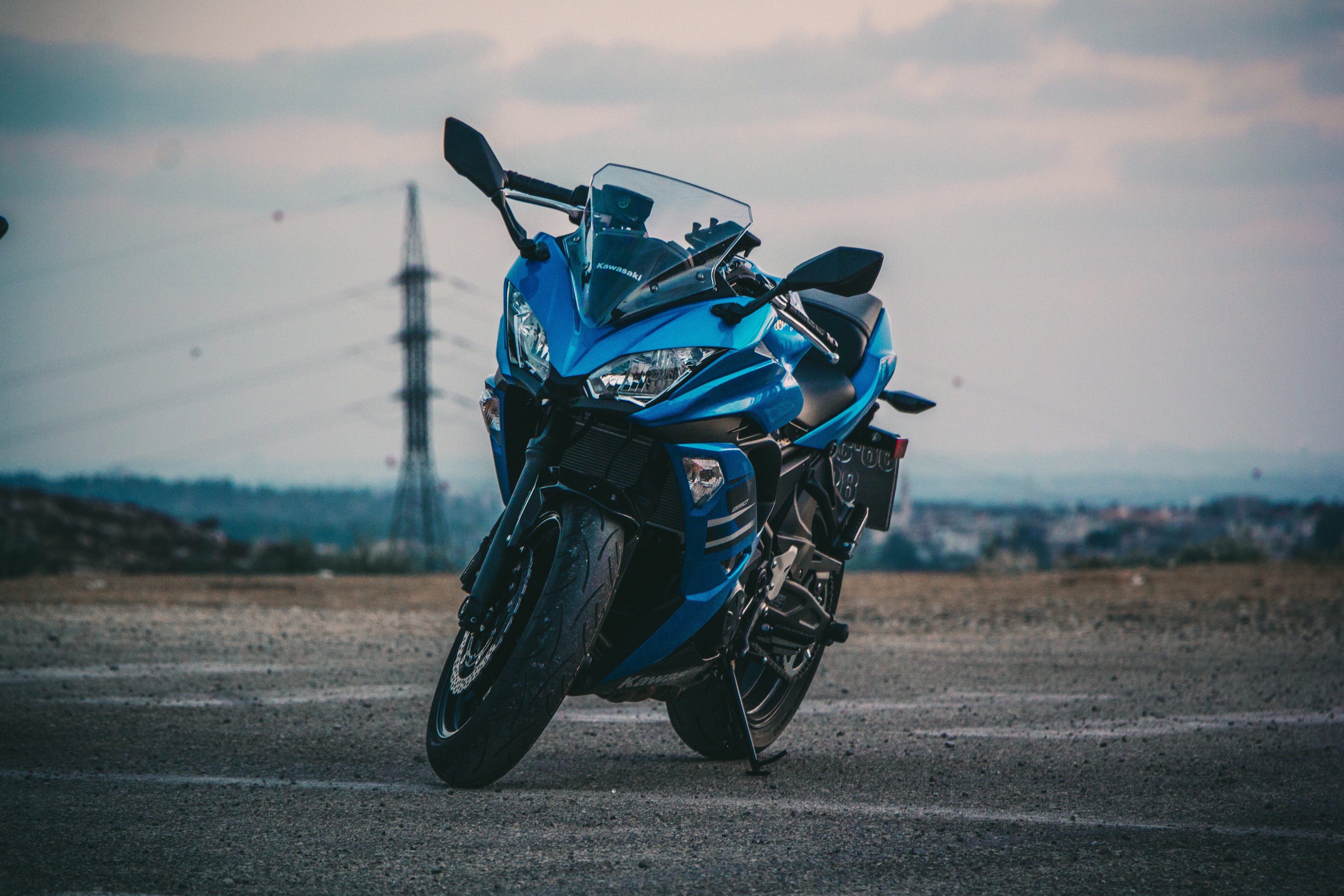 Blue Kawasaki motorcycle outdoors HD Wallpaper
