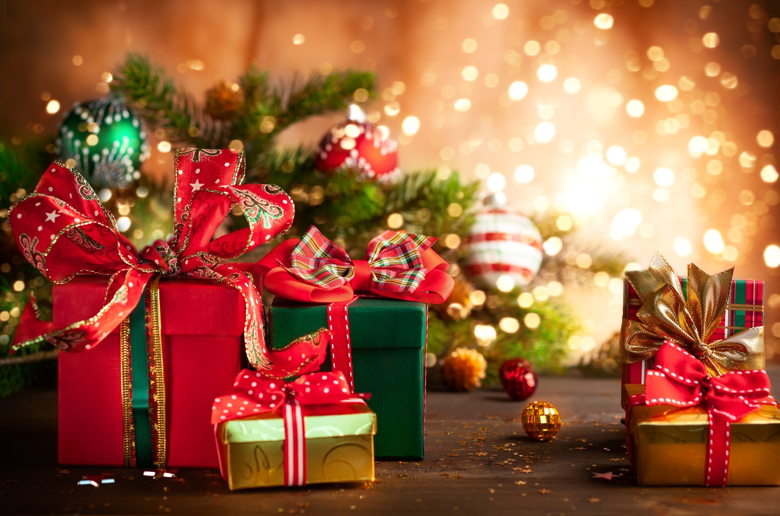 Christmas gifts and ornaments with bokeh lights HD Wallpaper