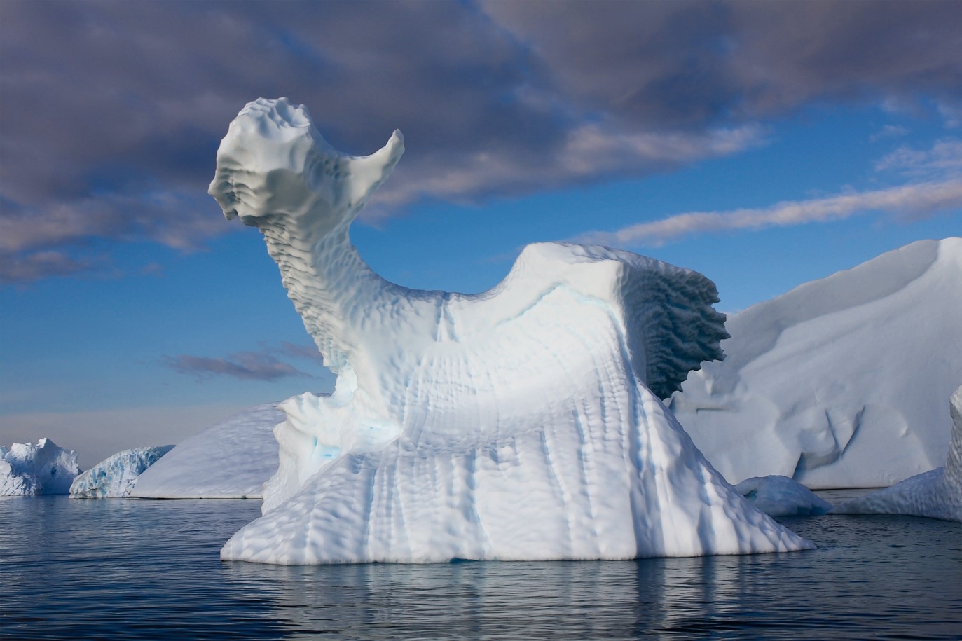 Iceberg shaped like a dragon in the ocean HD Wallpaper