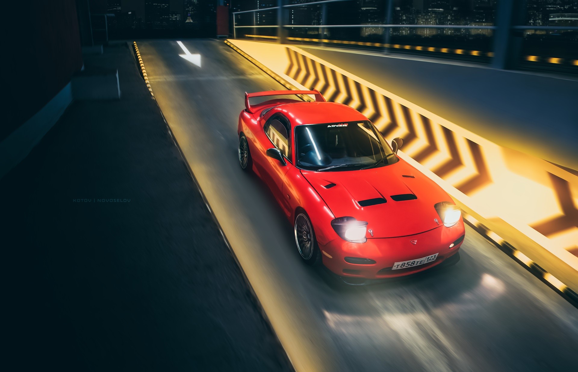 Red Mazda RX-7 sports car on a ramp at night HD Wallpaper