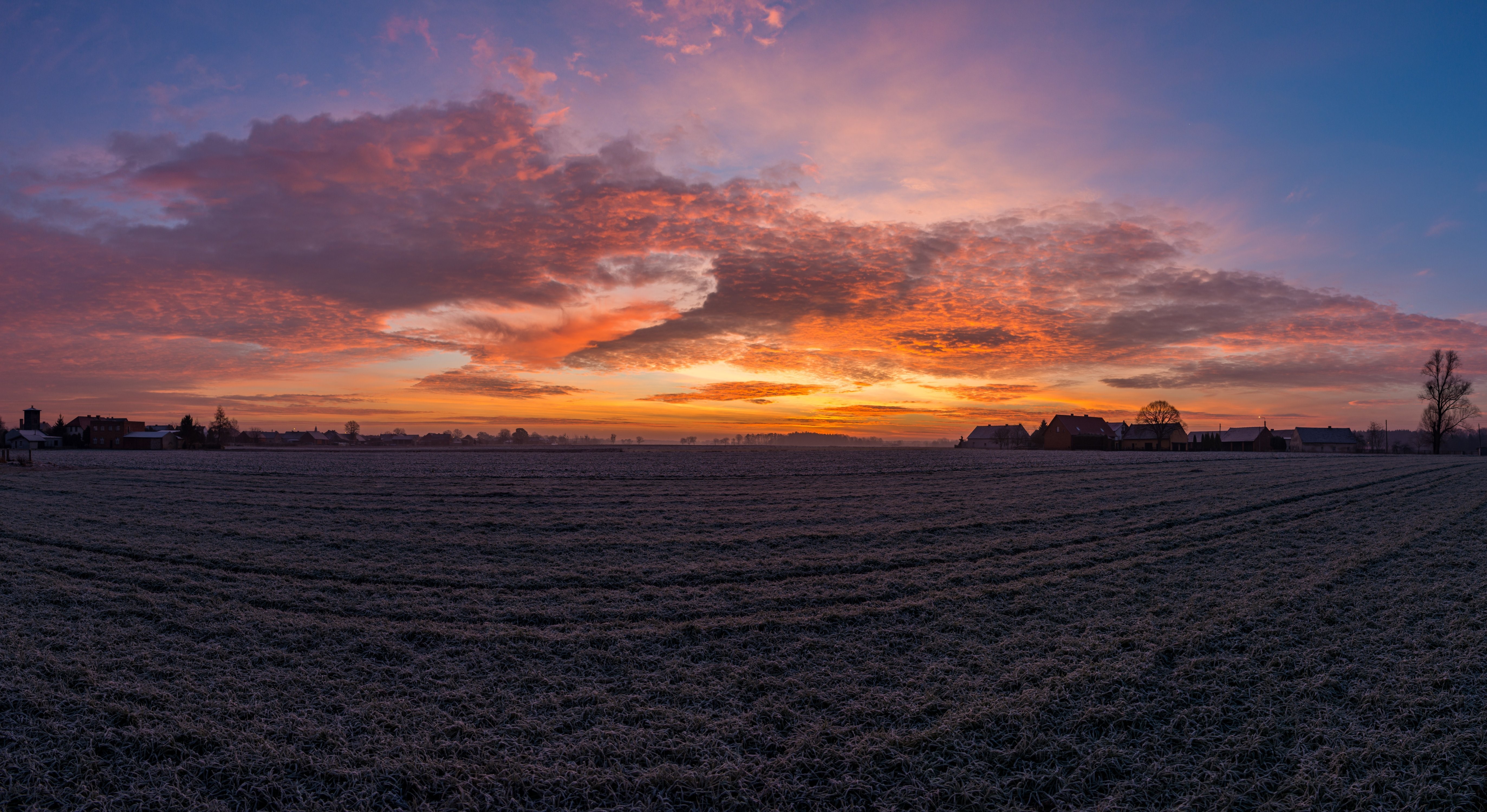 Sunrise over a frosty field in a Polish village HD Wallpaper