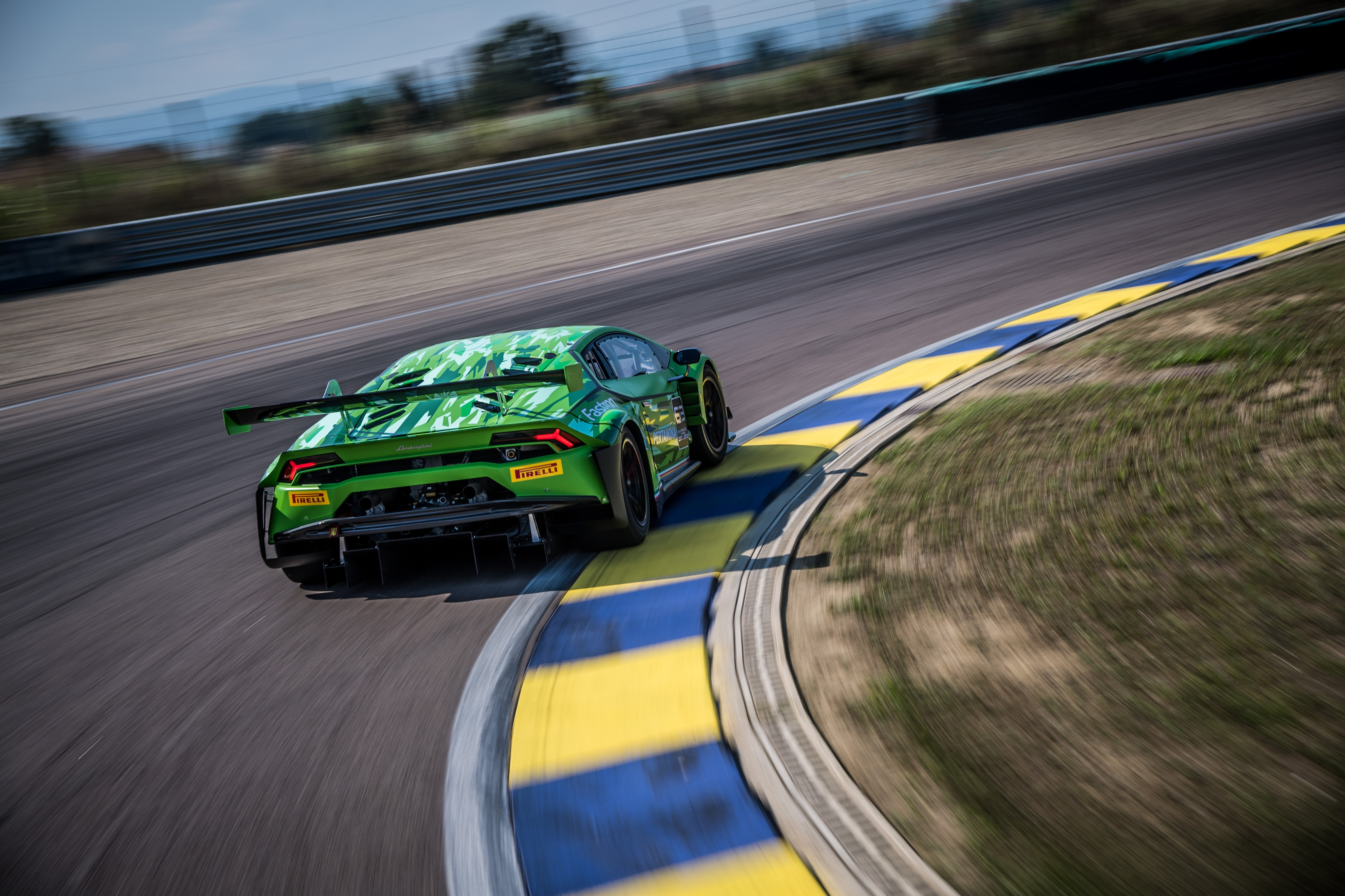 Green Lamborghini Huracan GT3 EVO race car on track HD Wallpaper
