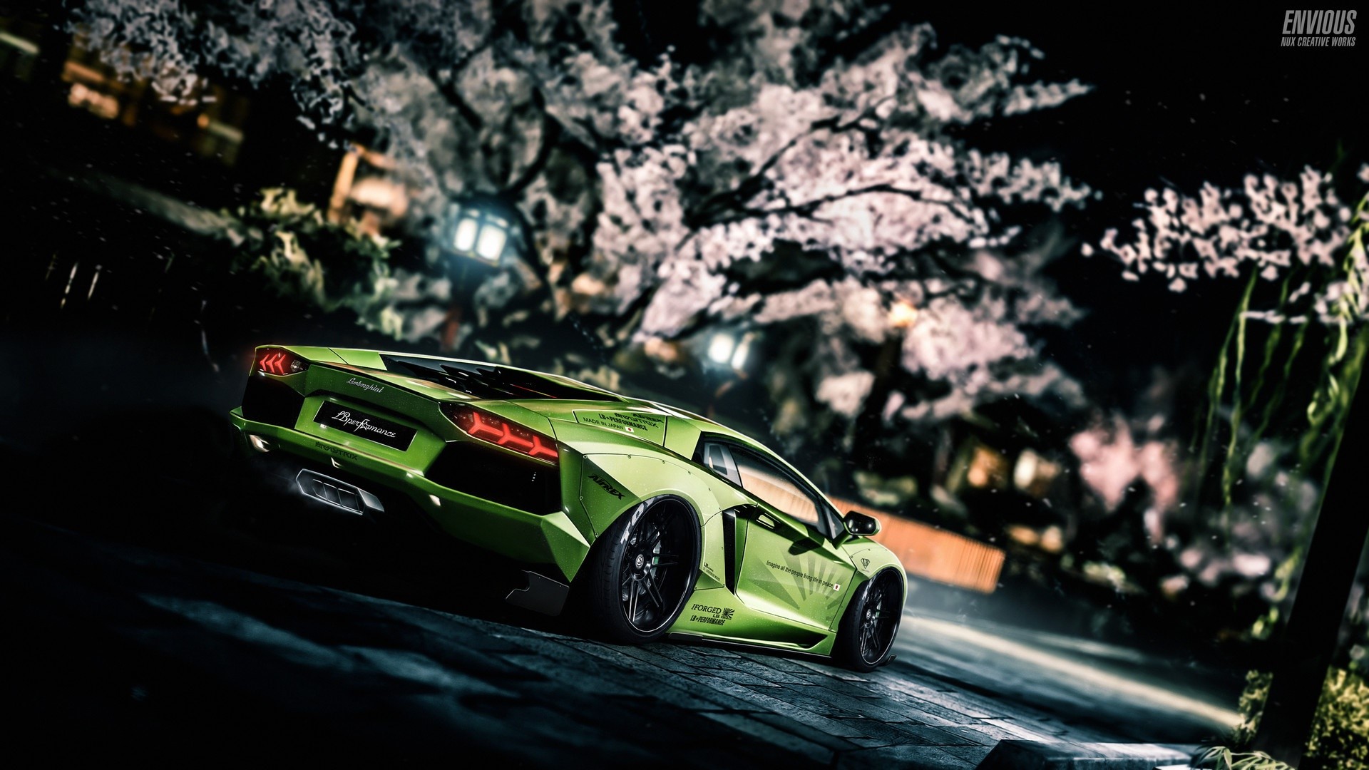 Green Lamborghini Aventador parked at night with cherry blossoms HD Wallpaper