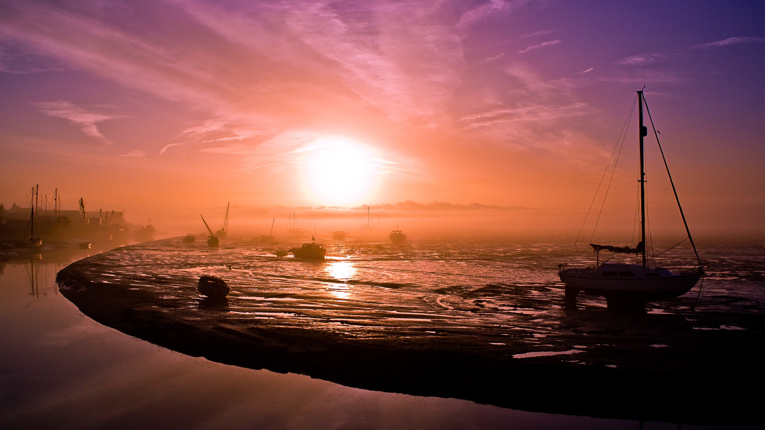 Boats in foggy sunrise over water HD Wallpaper