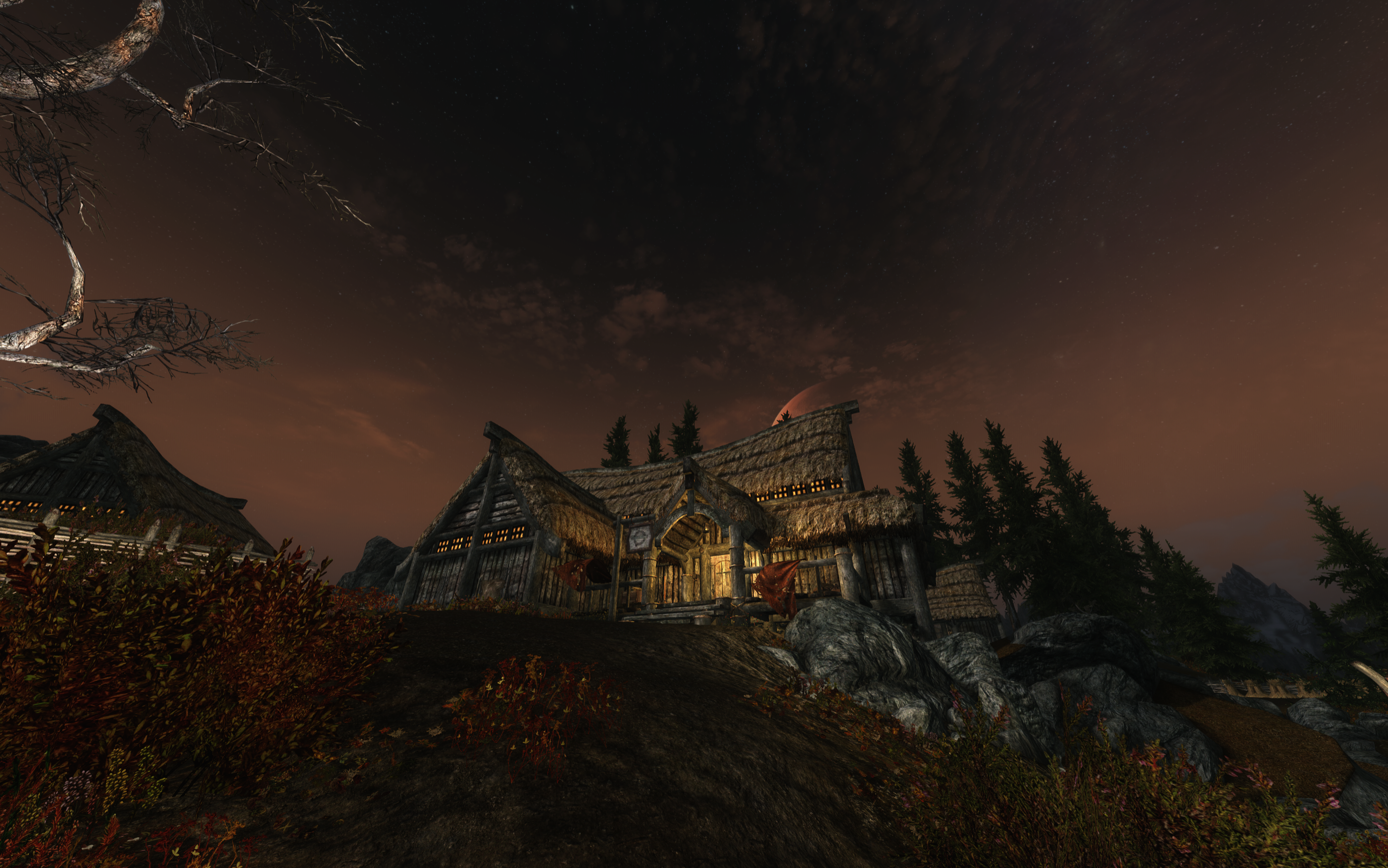 The Elder Scrolls V: Skyrim screenshot of a village at dusk HD Wallpaper
