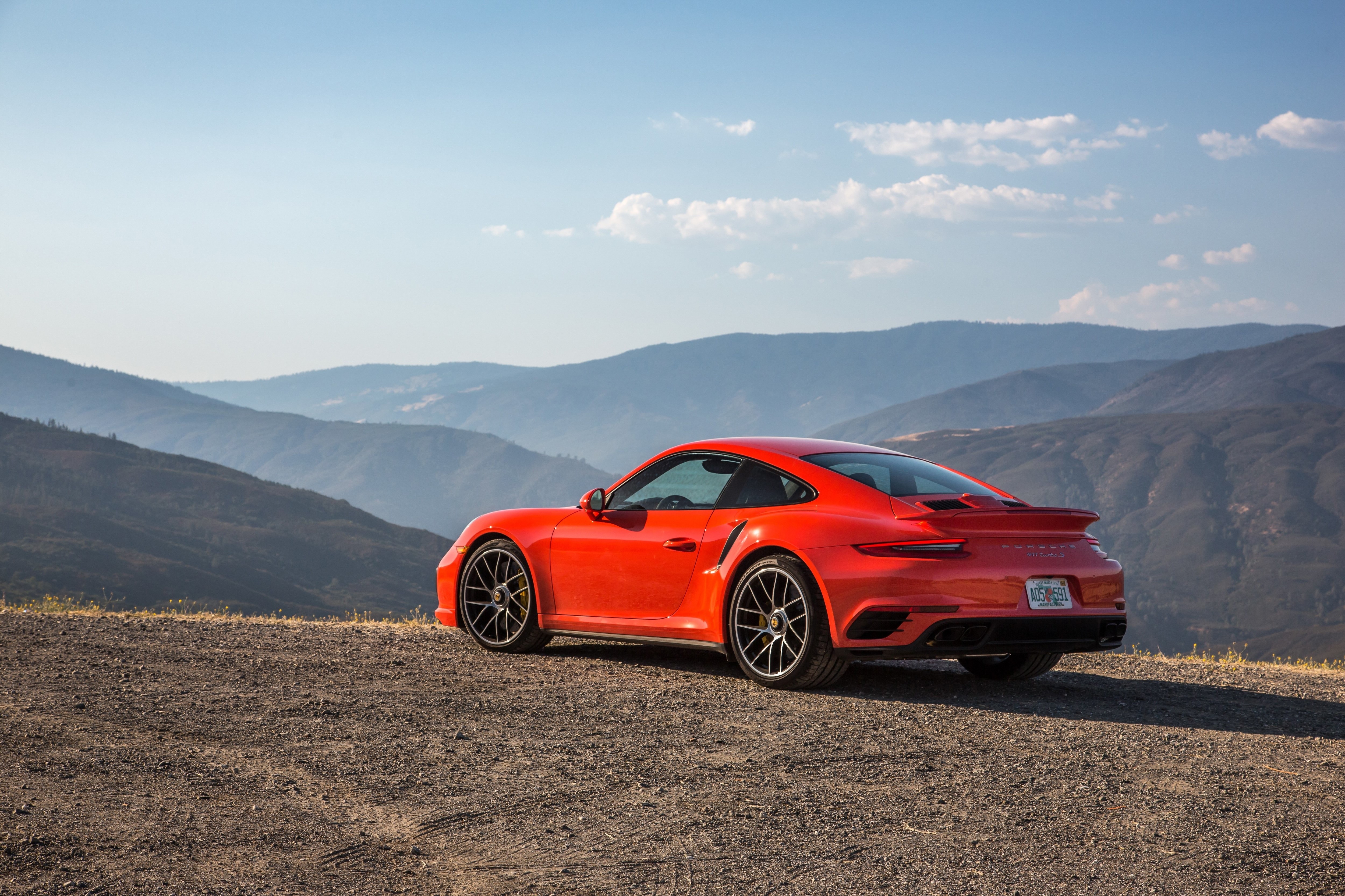 4K Orange Porsche 911 on Mountain Road HD Wallpaper