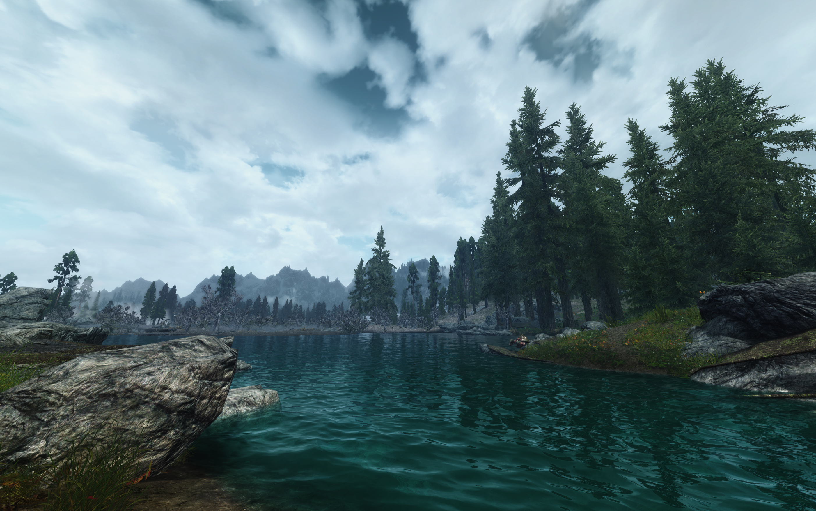 The Elder Scrolls V: Skyrim landscape with lake and mountains HD Wallpaper