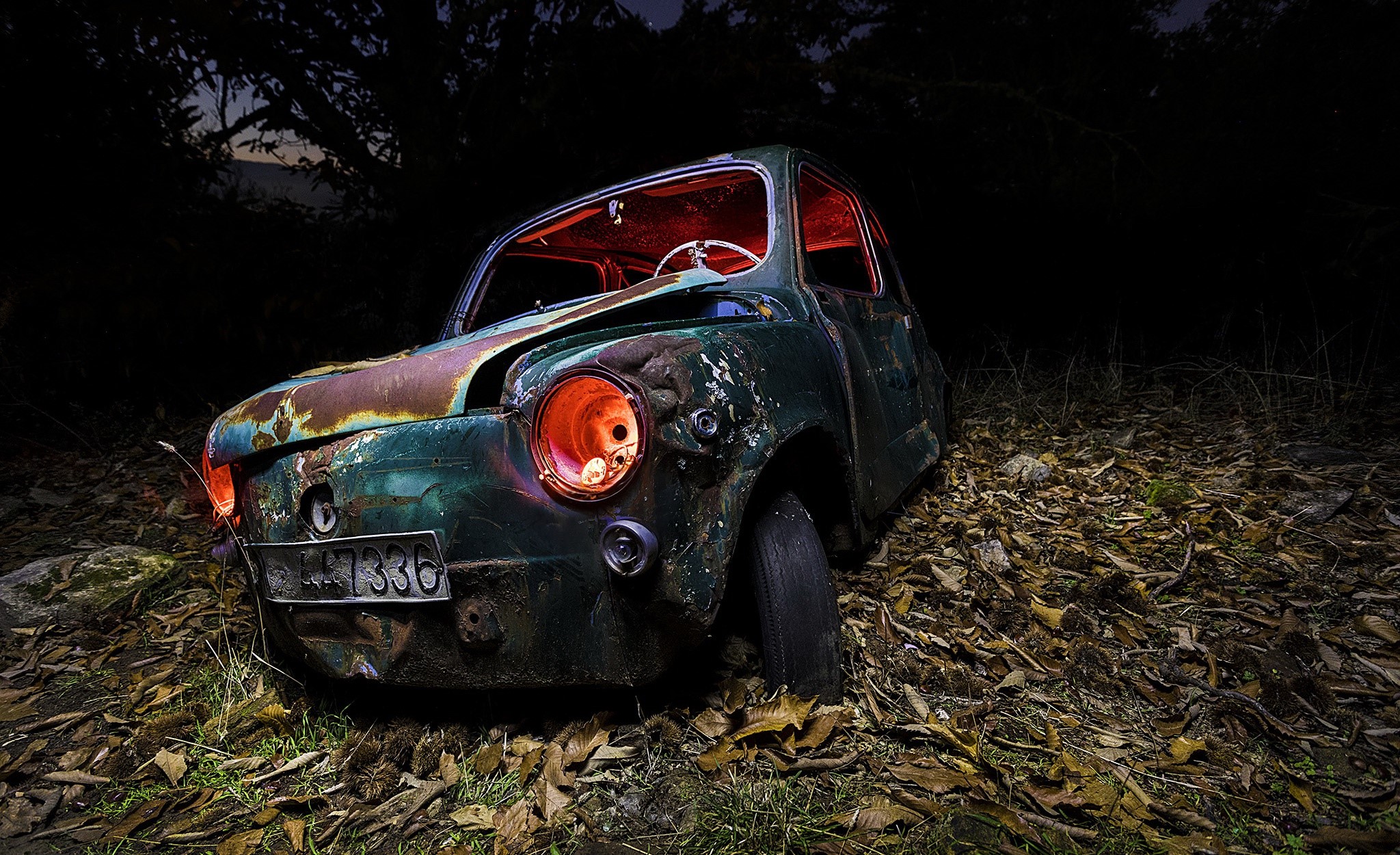 Abandoned rusty car at night HD Wallpaper