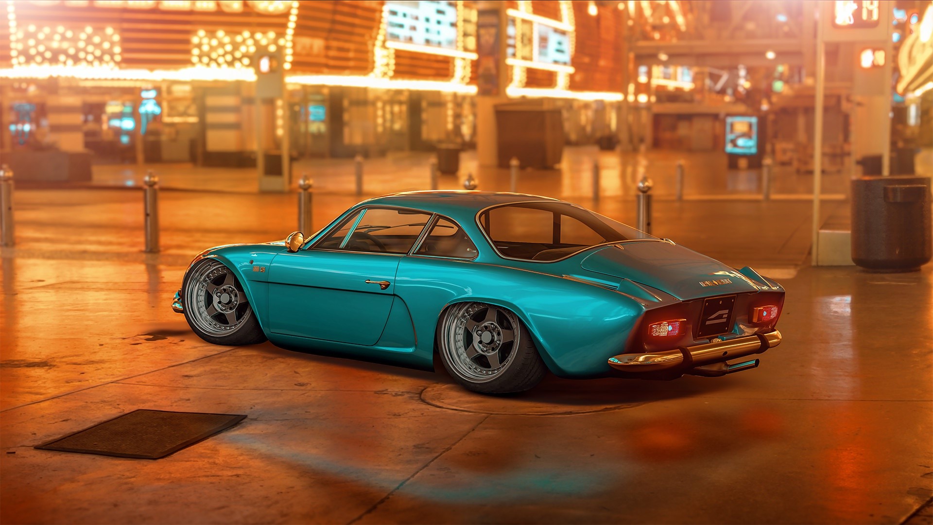 Stanced turquoise Alpine A110 in a city at night HD Wallpaper