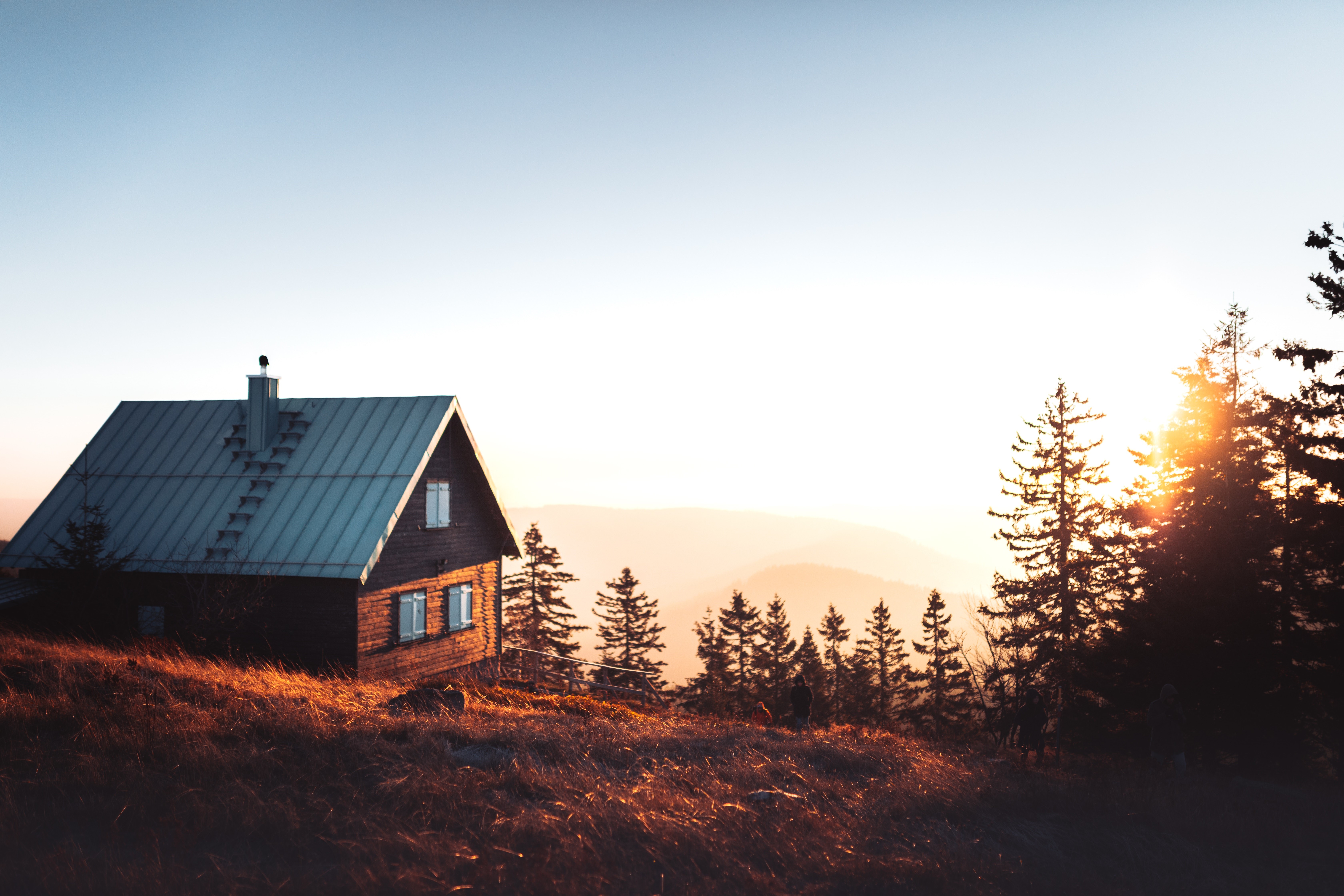 Cabin in the mountains at sunset HD Wallpaper