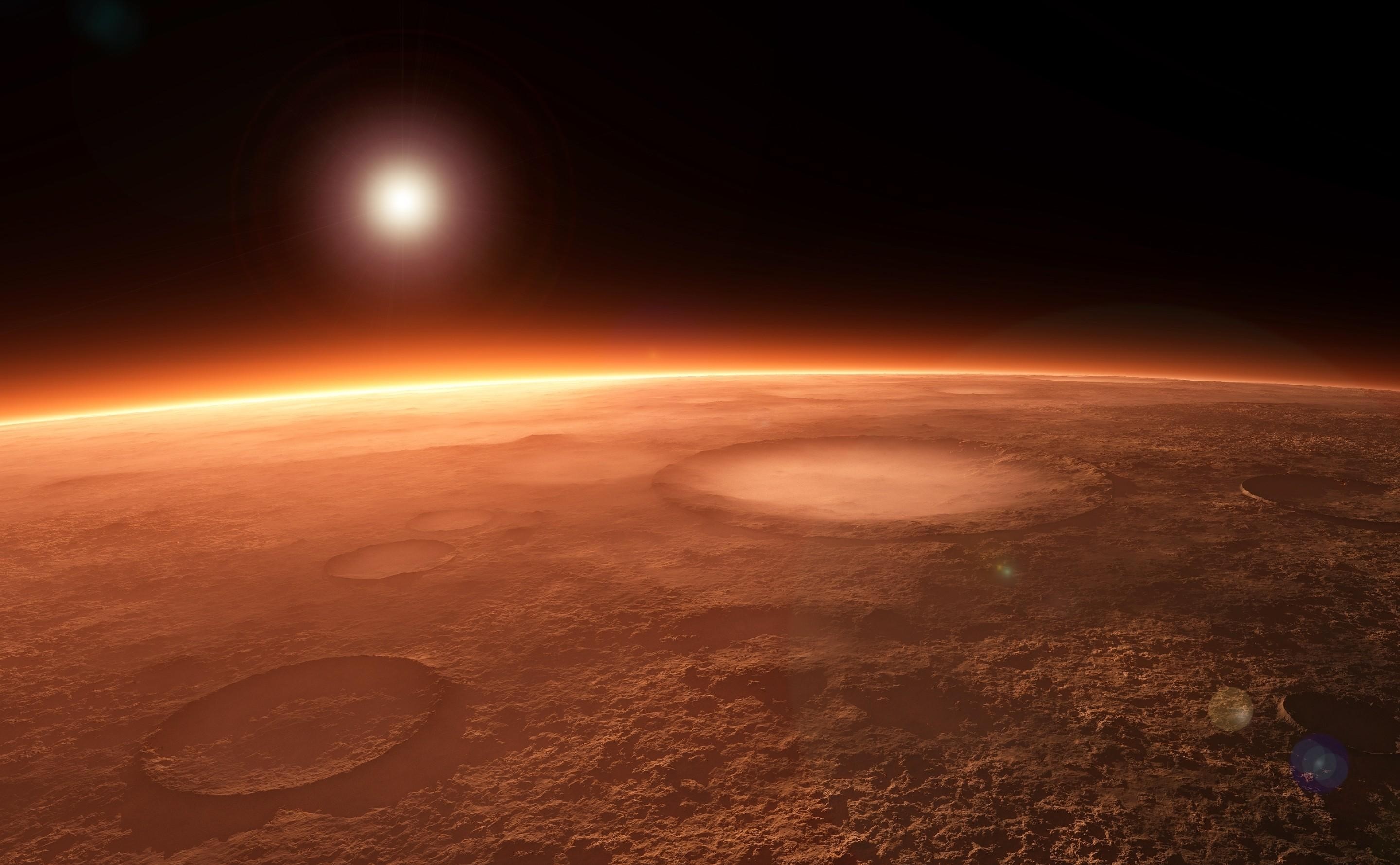 Mars surface with craters and sun HD Wallpaper