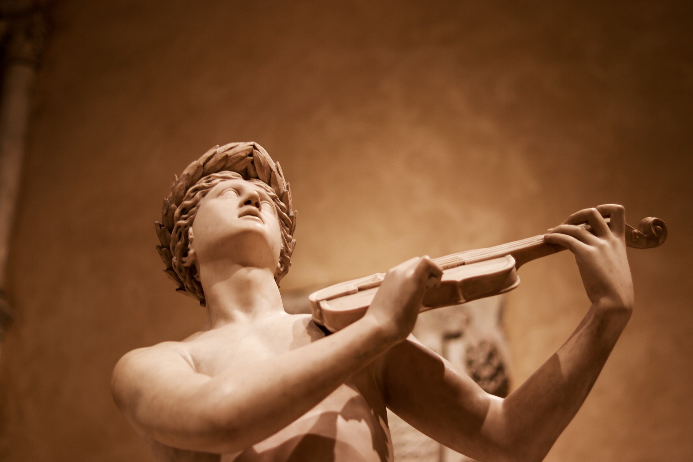 Marble sculpture of Apollo playing a violin HD Wallpaper