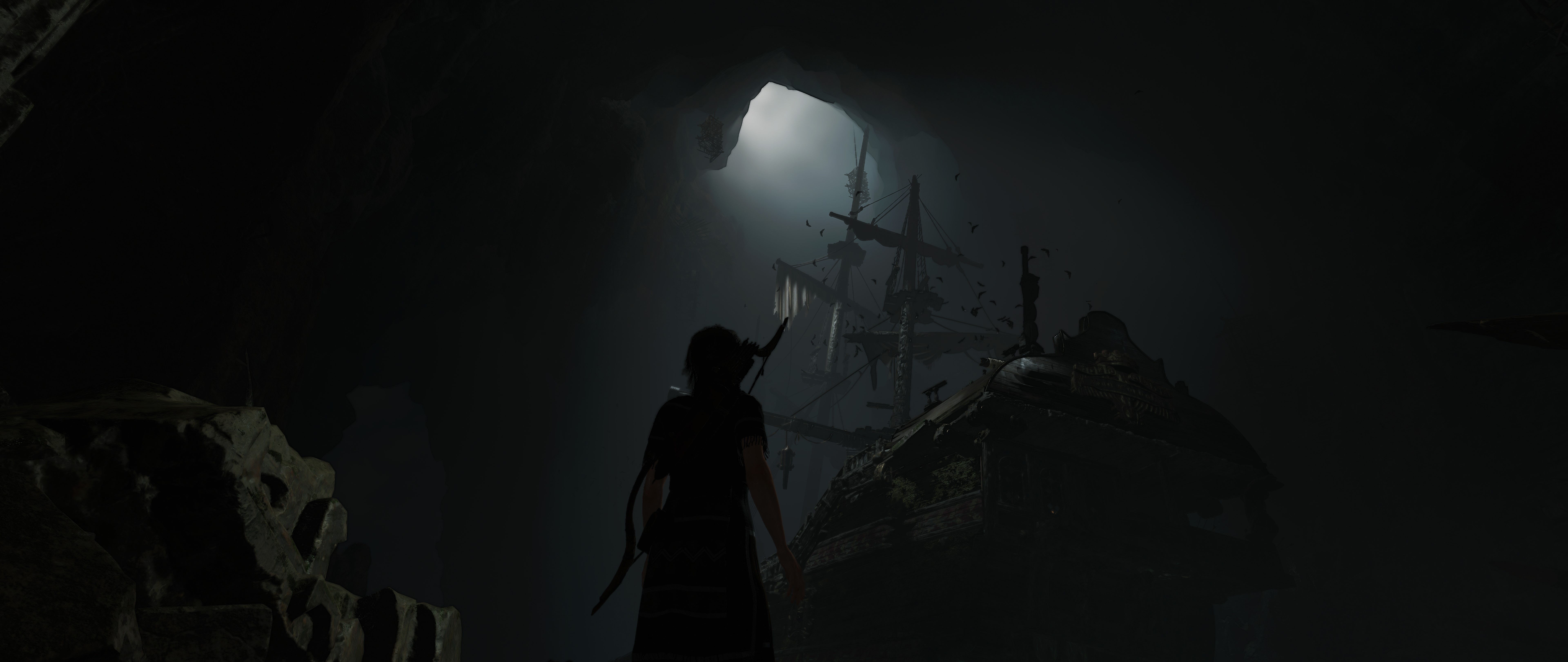 Lara Croft from Shadow of the Tomb Raider in a cave with a ship HD Wallpaper