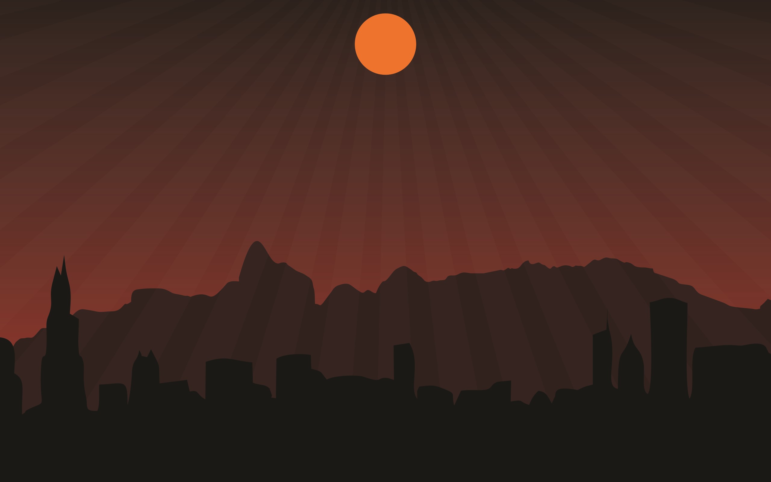 Silhouette of a city and mountains at sunset HD Wallpaper