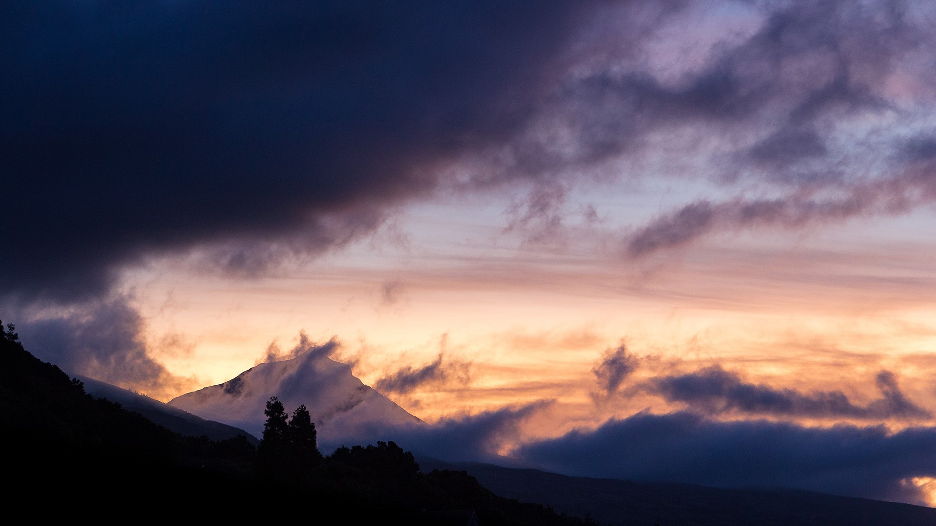 Mountains and clouds at sunset HD Wallpaper