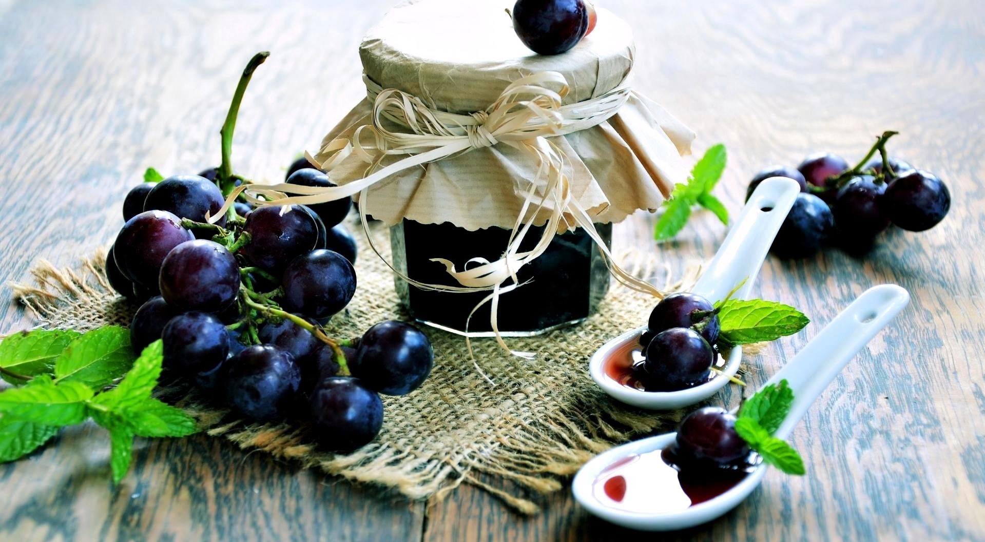 Grape jam in a jar with fresh grapes and mint HD Wallpaper