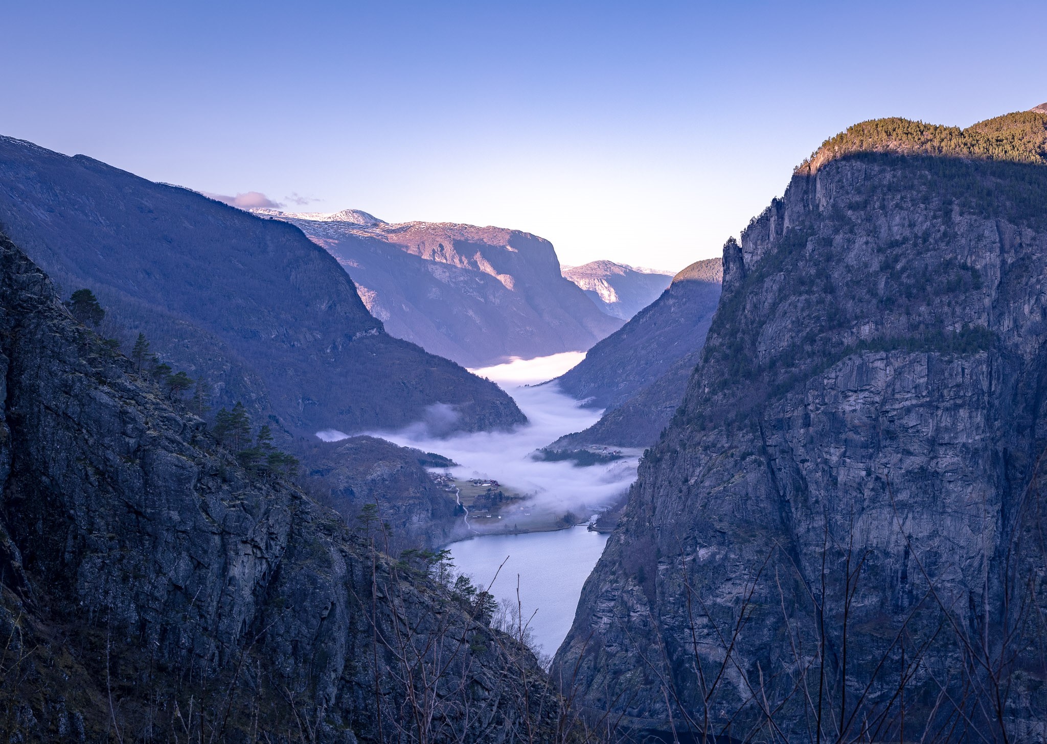 Misty fjord landscape in Norway with mountains HD Wallpaper