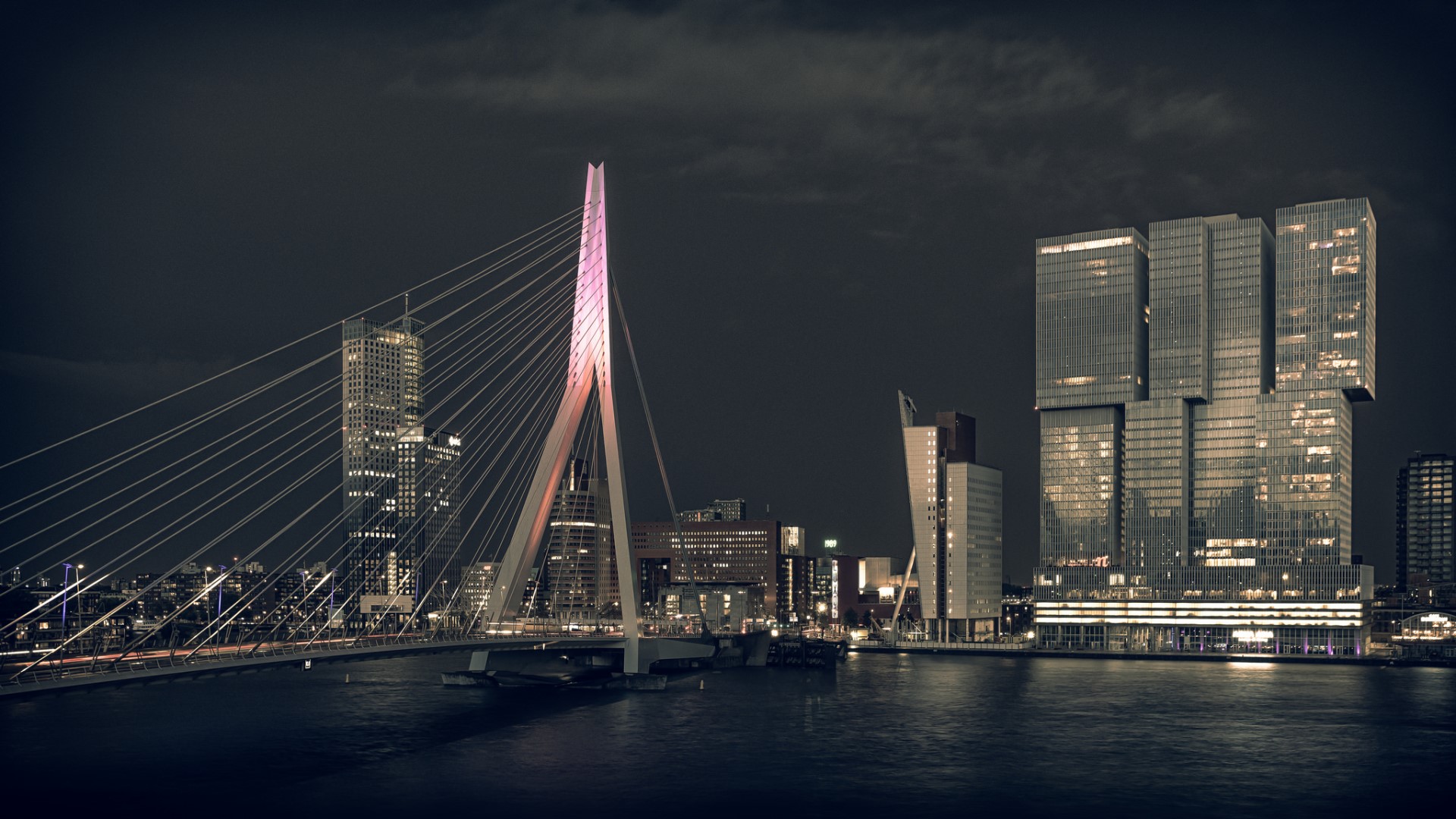 Erasmus Bridge and skyscrapers in Rotterdam at night HD Wallpaper