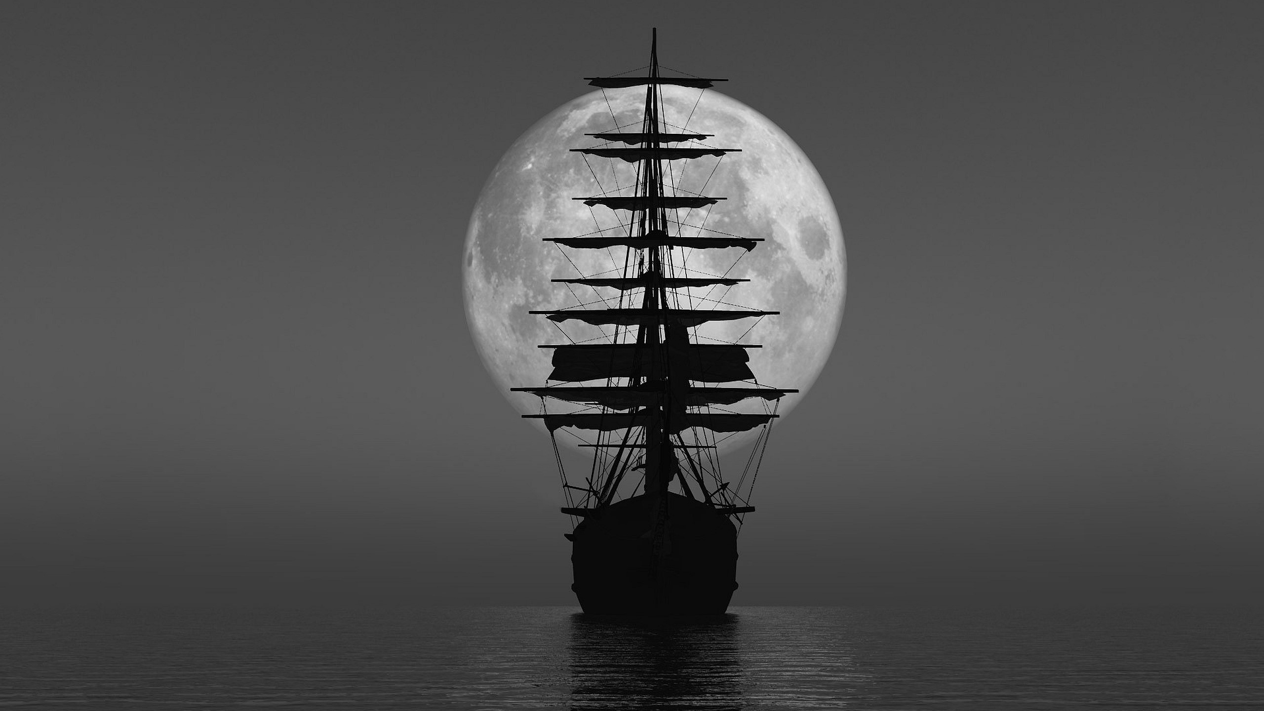 Silhouette of a sailing ship against the moon HD Wallpaper