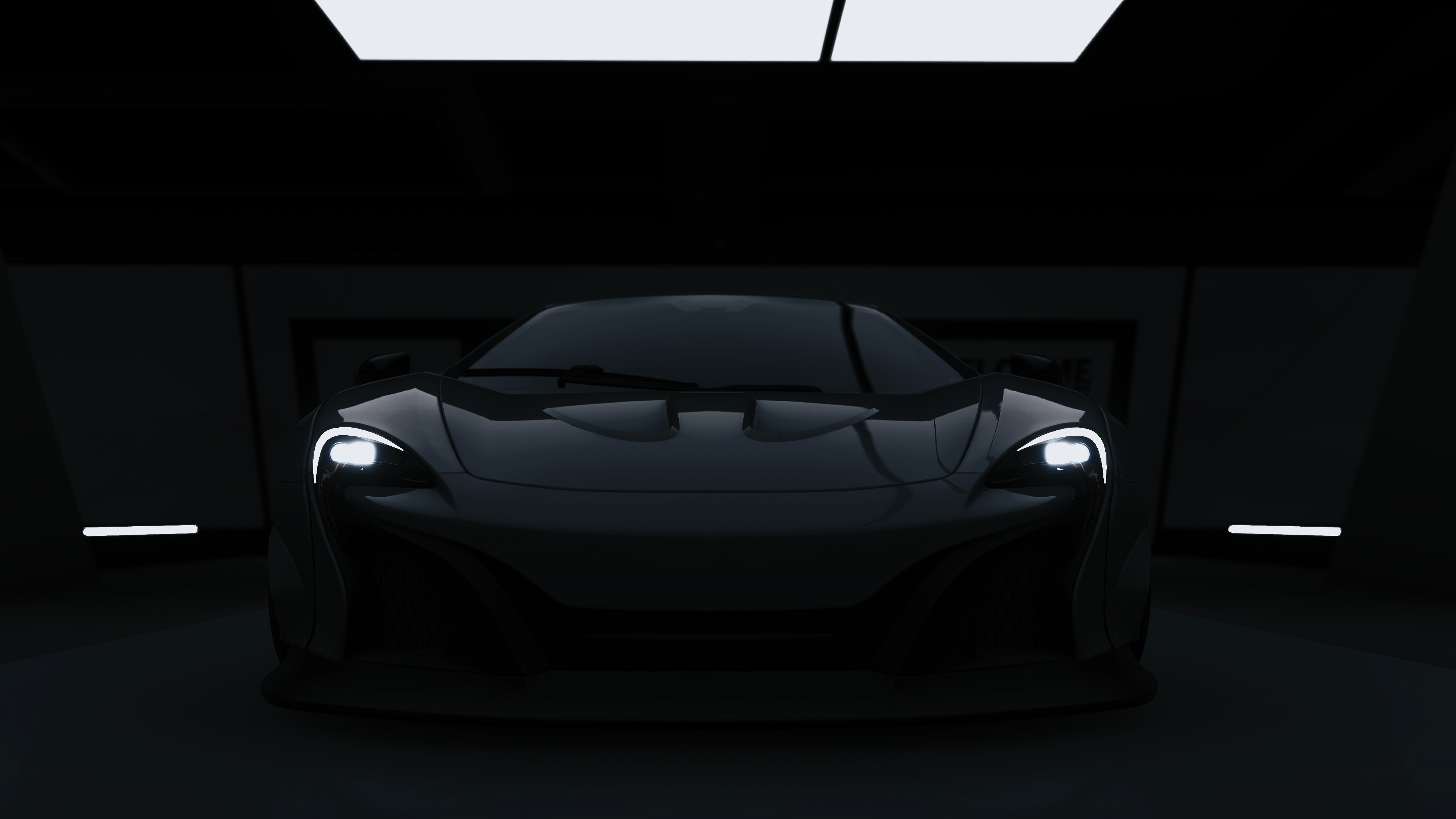 Dark McLaren sports car in a garage HD Wallpaper