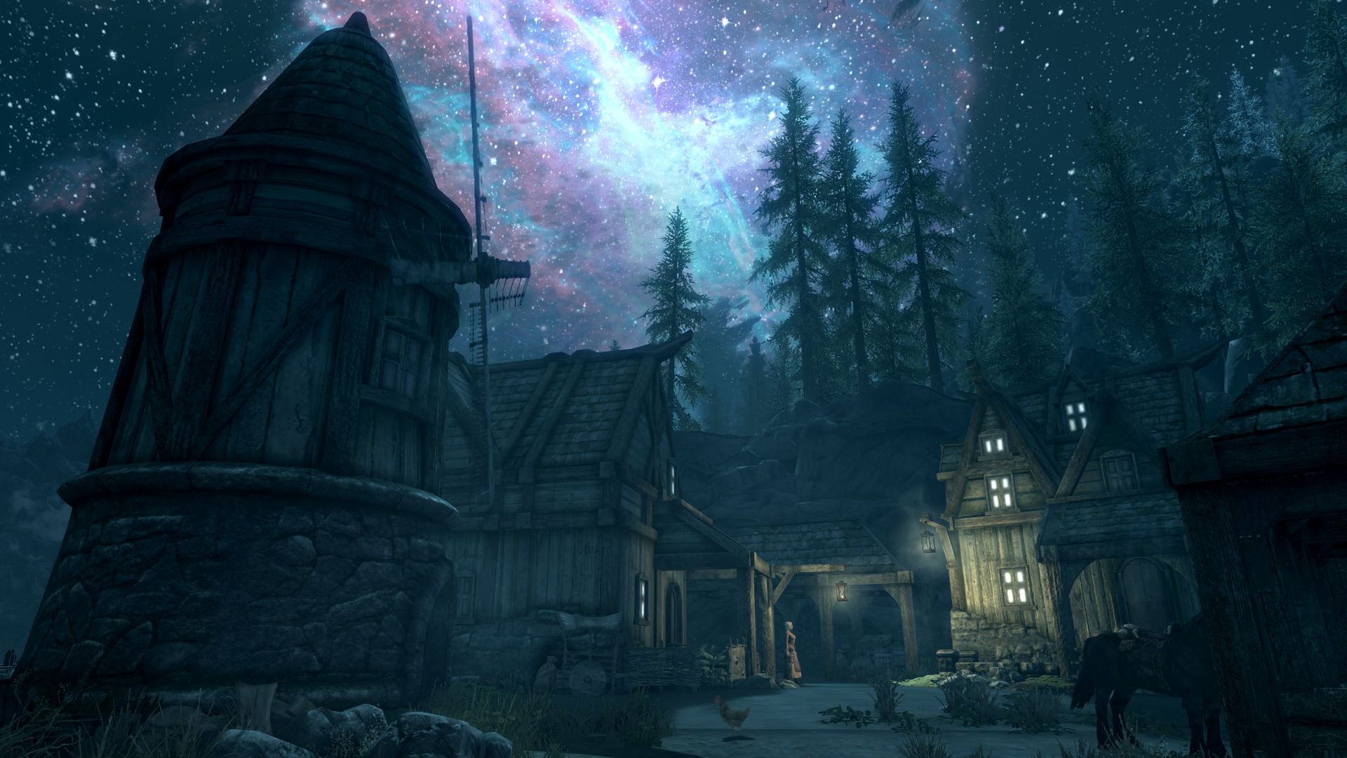 The Elder Scrolls V: Skyrim village under a starry galaxy sky HD Wallpaper
