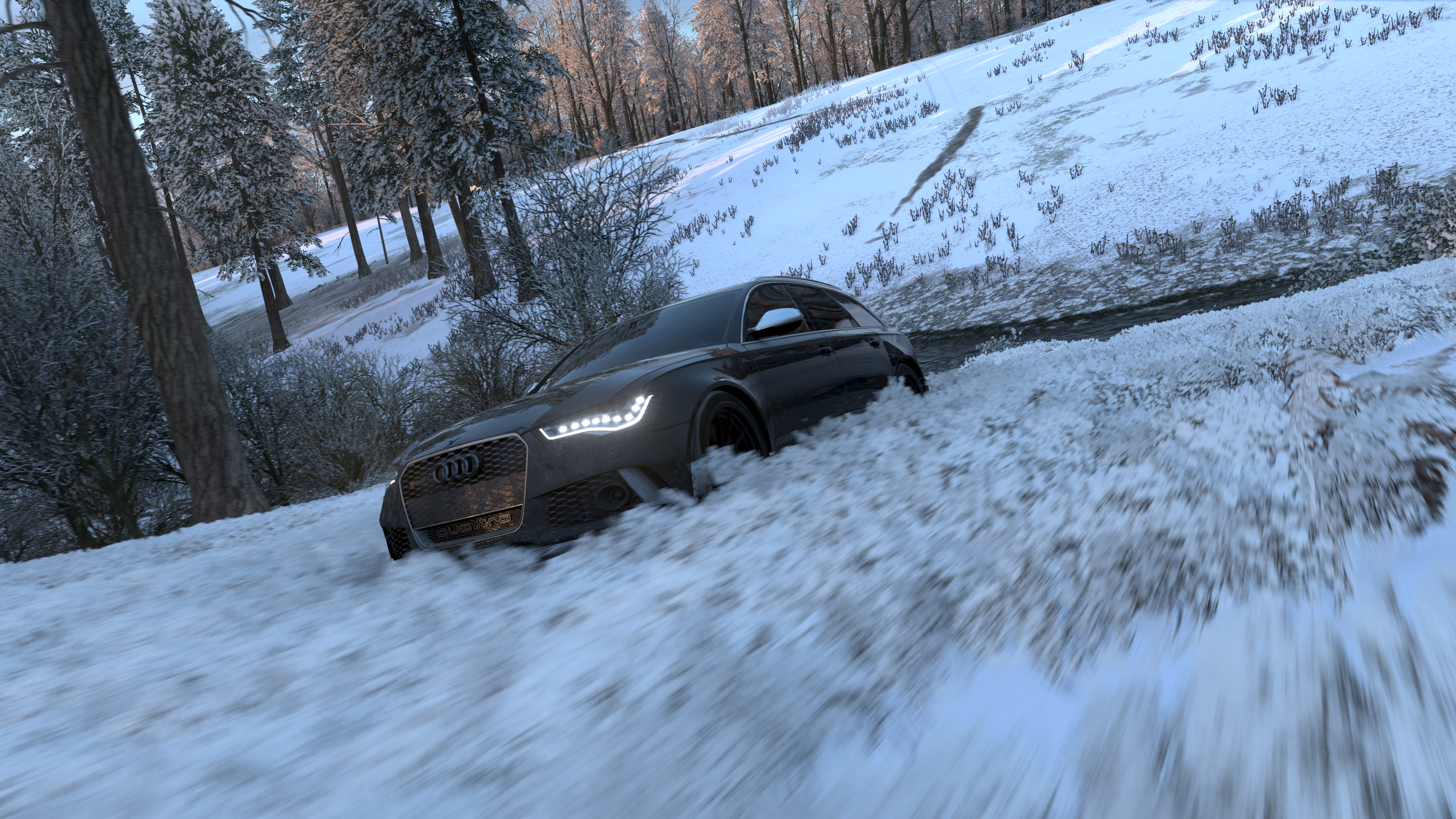 Audi car driving through snow in Forza Horizon 4 HD Wallpaper