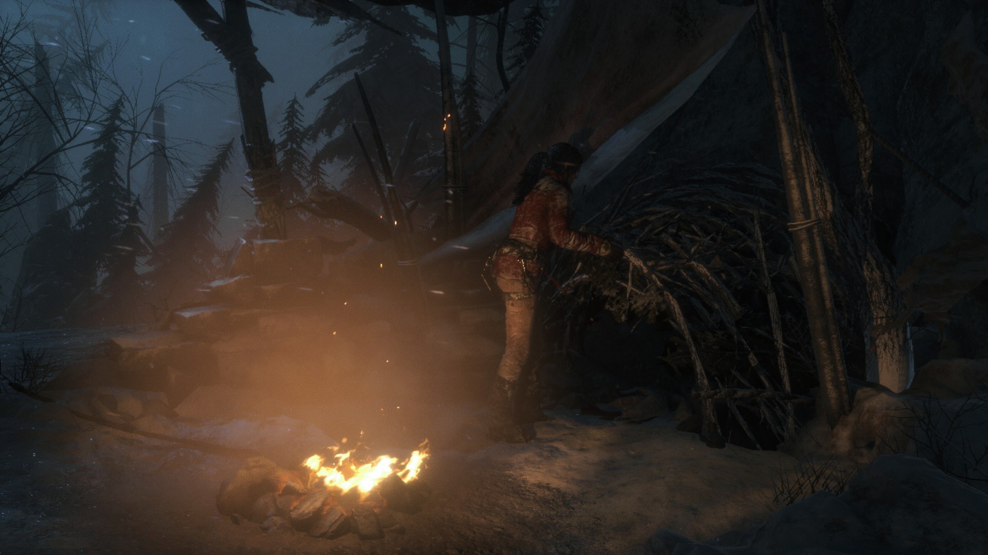Lara Croft in a winter shelter with a campfire in Rise of the Tomb Raider HD Wallpaper