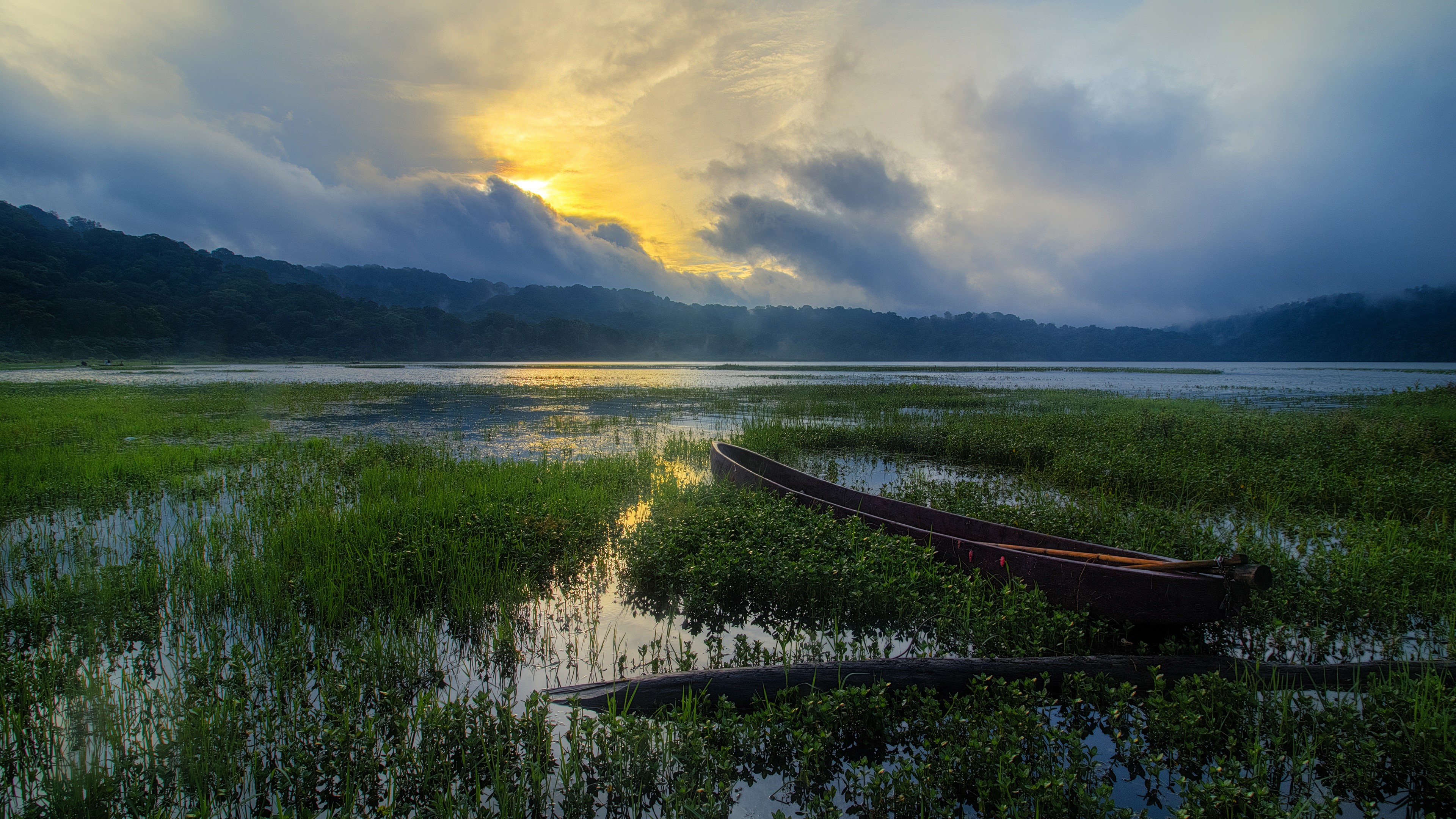 4K boat on a misty lake at sunrise HD Wallpaper