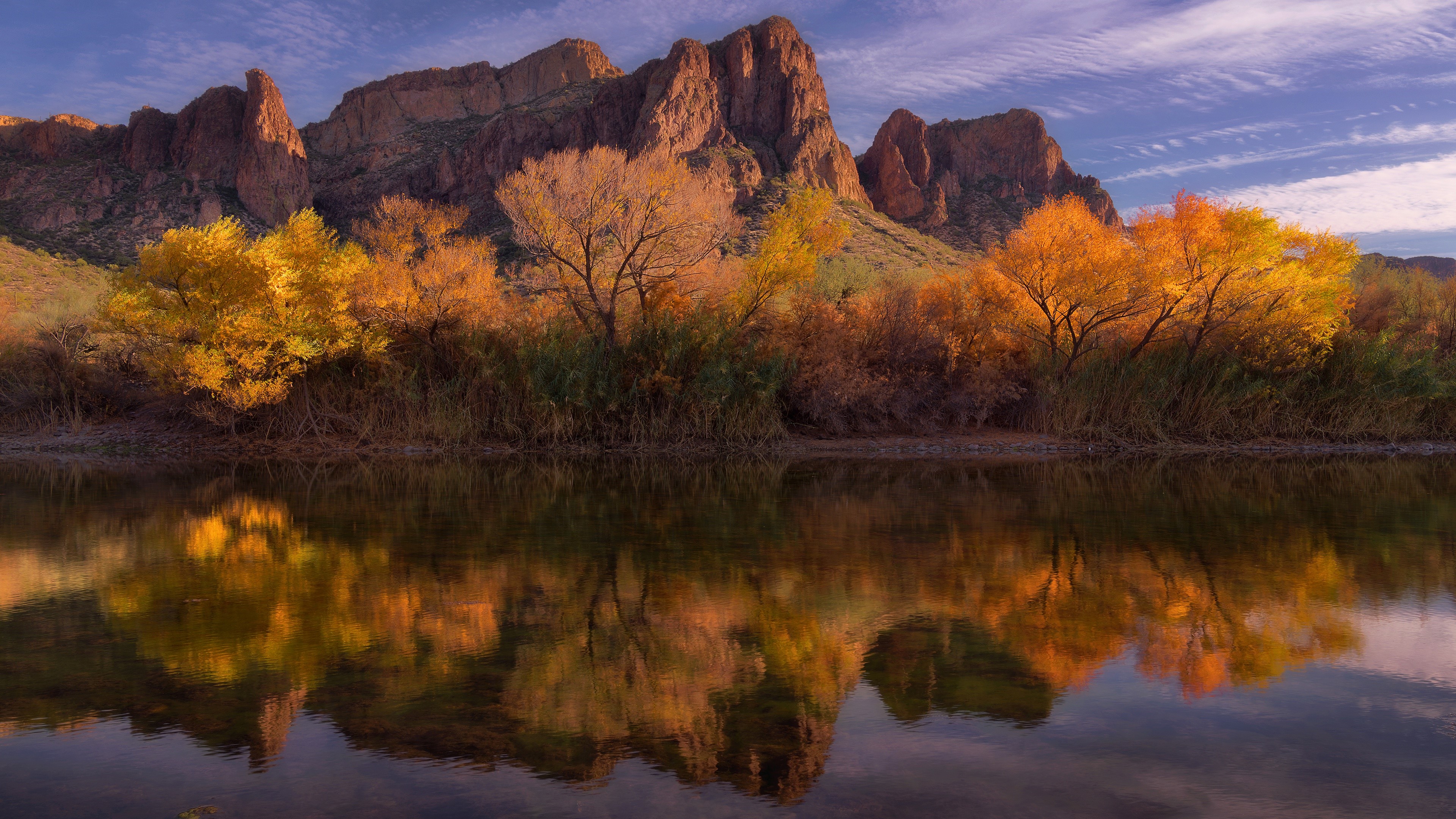 Fall foliage reflects in a river with mountains in Arizona HD Wallpaper