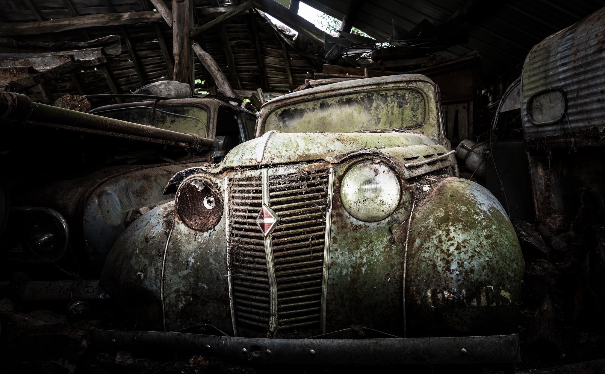 Abandoned Renault car in a dilapidated barn HD Wallpaper