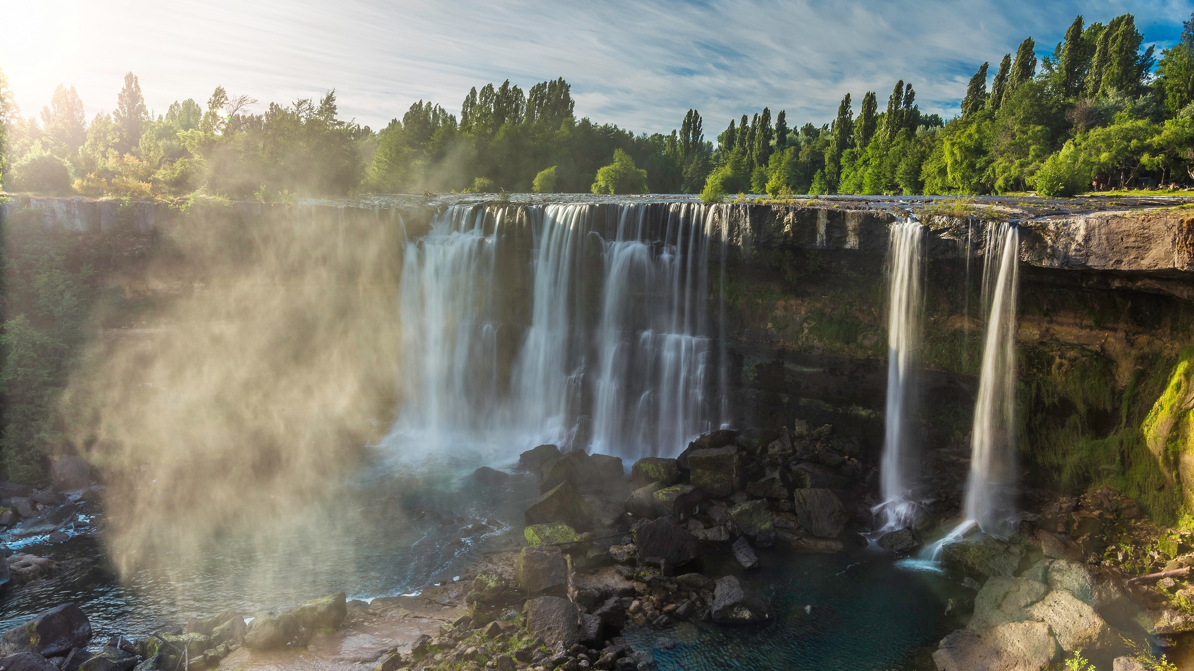Waterfall in a forest landscape HD Wallpaper