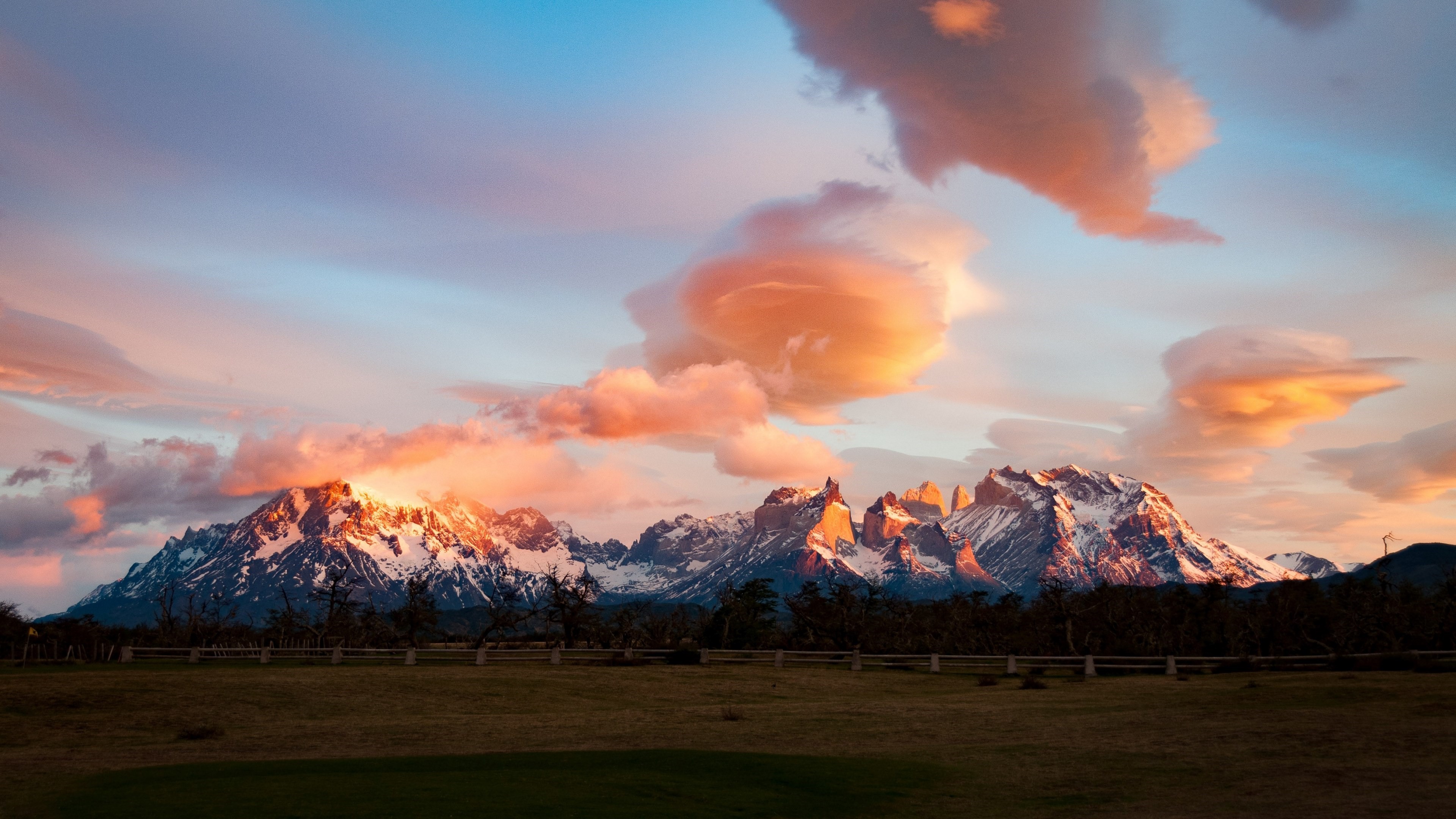 4K mountains with colorful clouds at sunset HD Wallpaper