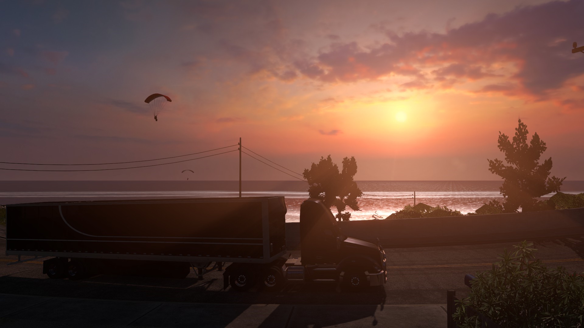 American Truck Simulator: Sunset over the sea with paragliders HD Wallpaper