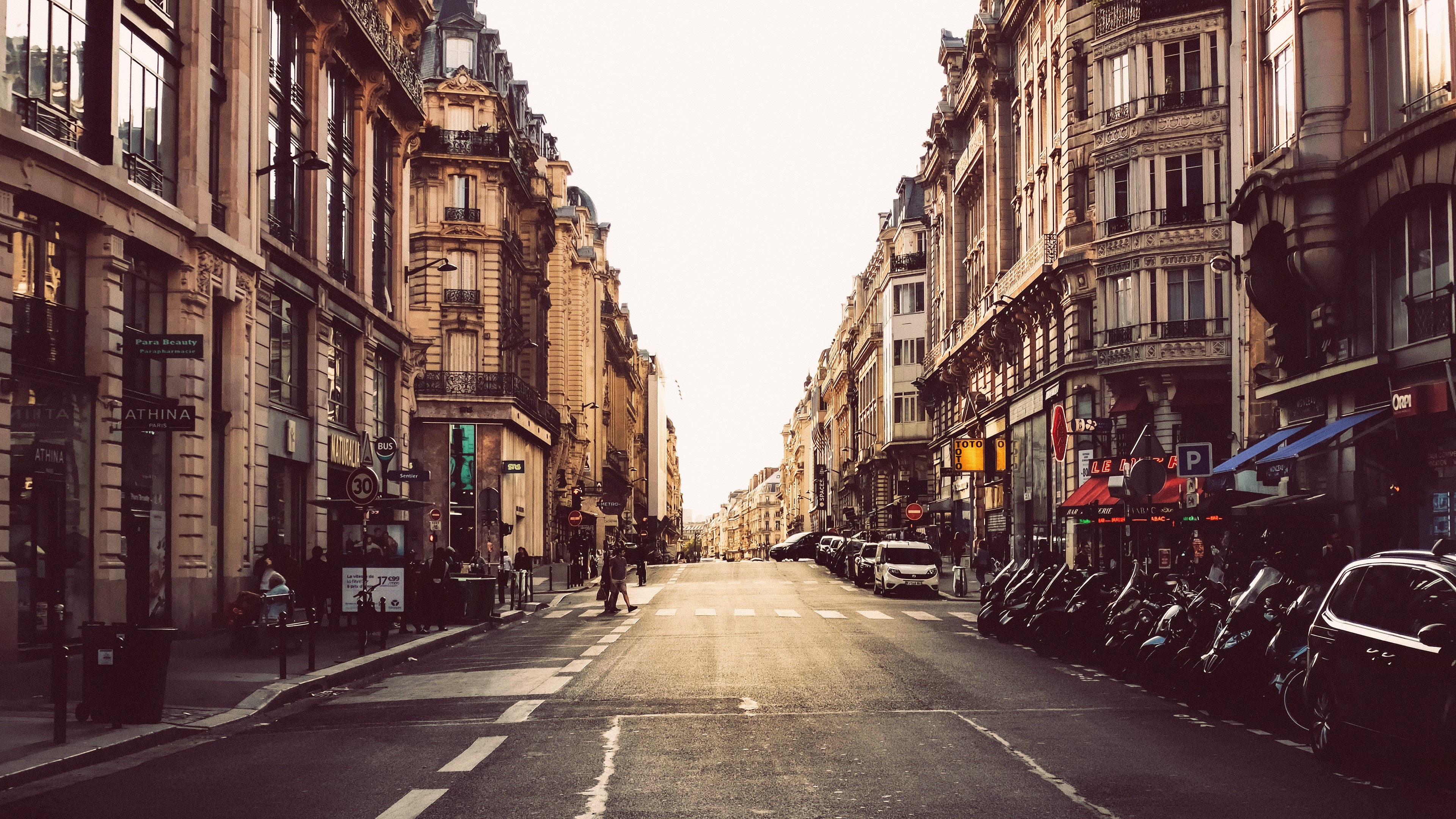 4K Paris street cityscape with buildings and parked motorcycles HD Wallpaper