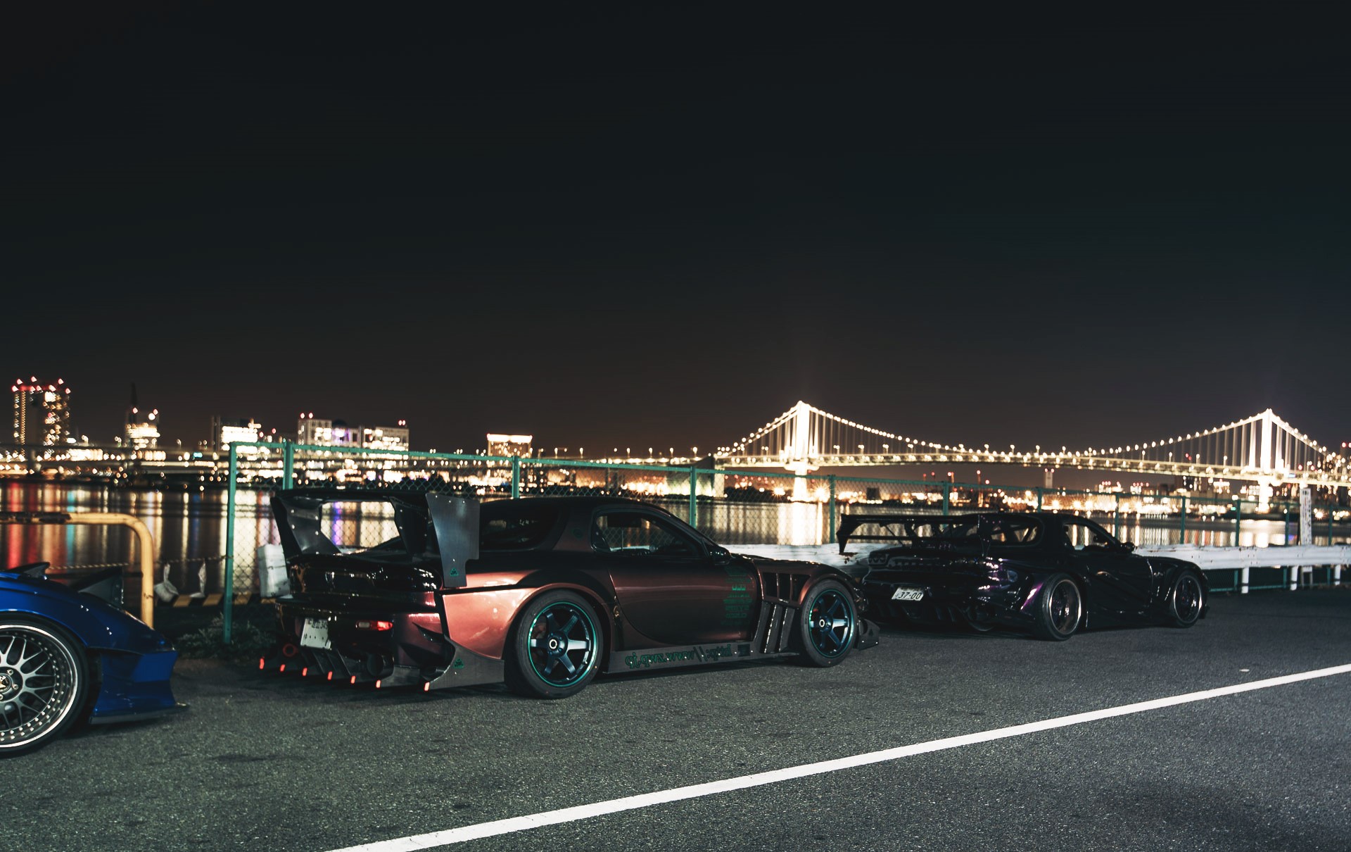 Modified Mazda RX-7 FD cars at night with city skyline HD Wallpaper