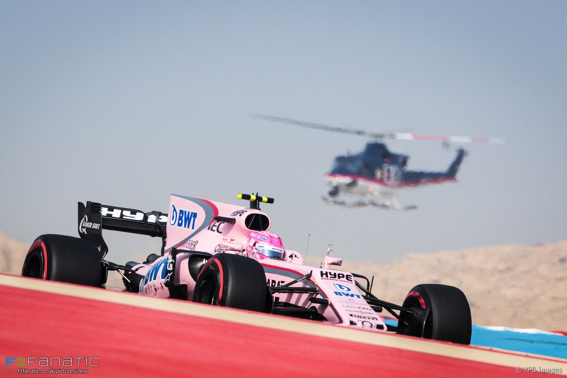 Esteban Ocon's Force India car with helicopter in Bahrain HD Wallpaper