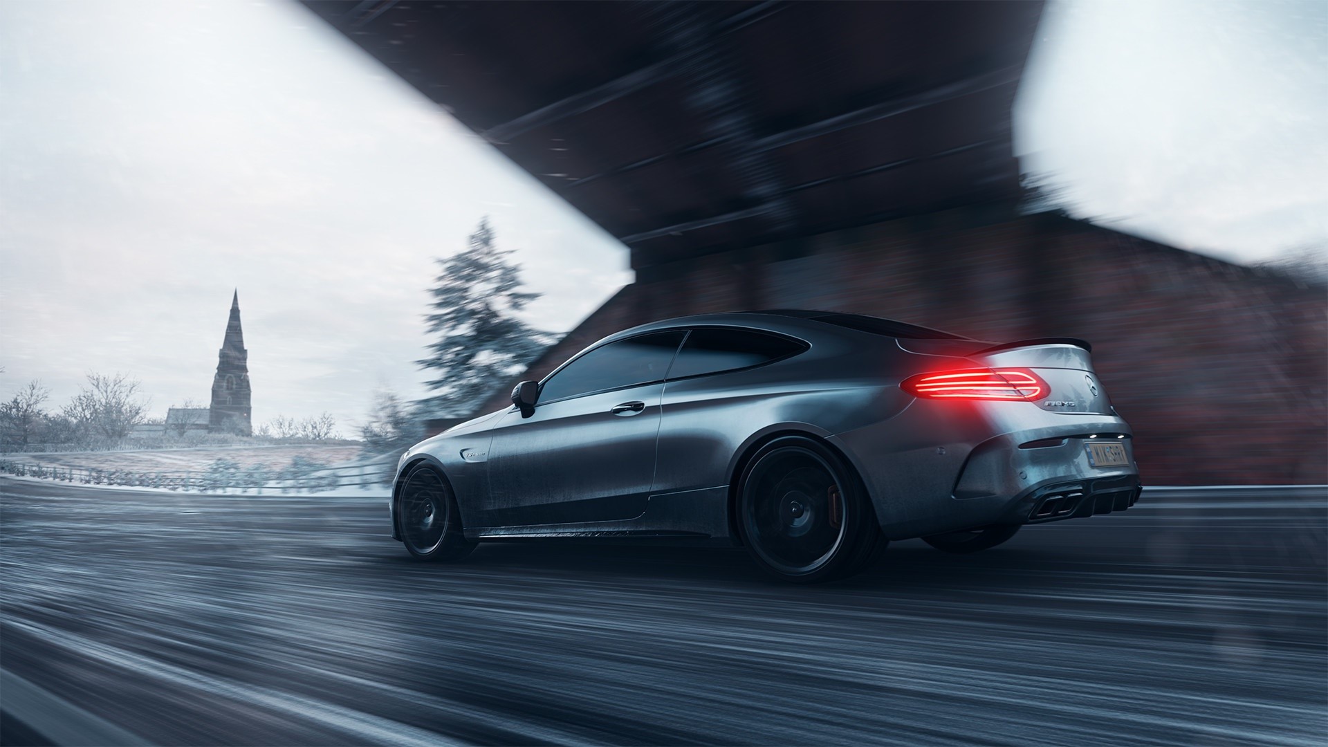 Mercedes-AMG C63S driving on a snowy road HD Wallpaper