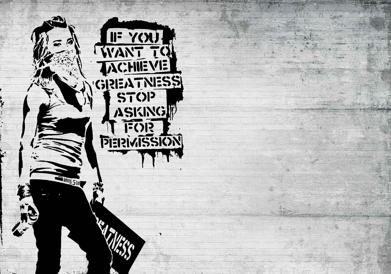 Graffiti of a woman with a message on a concrete wall HD Wallpaper