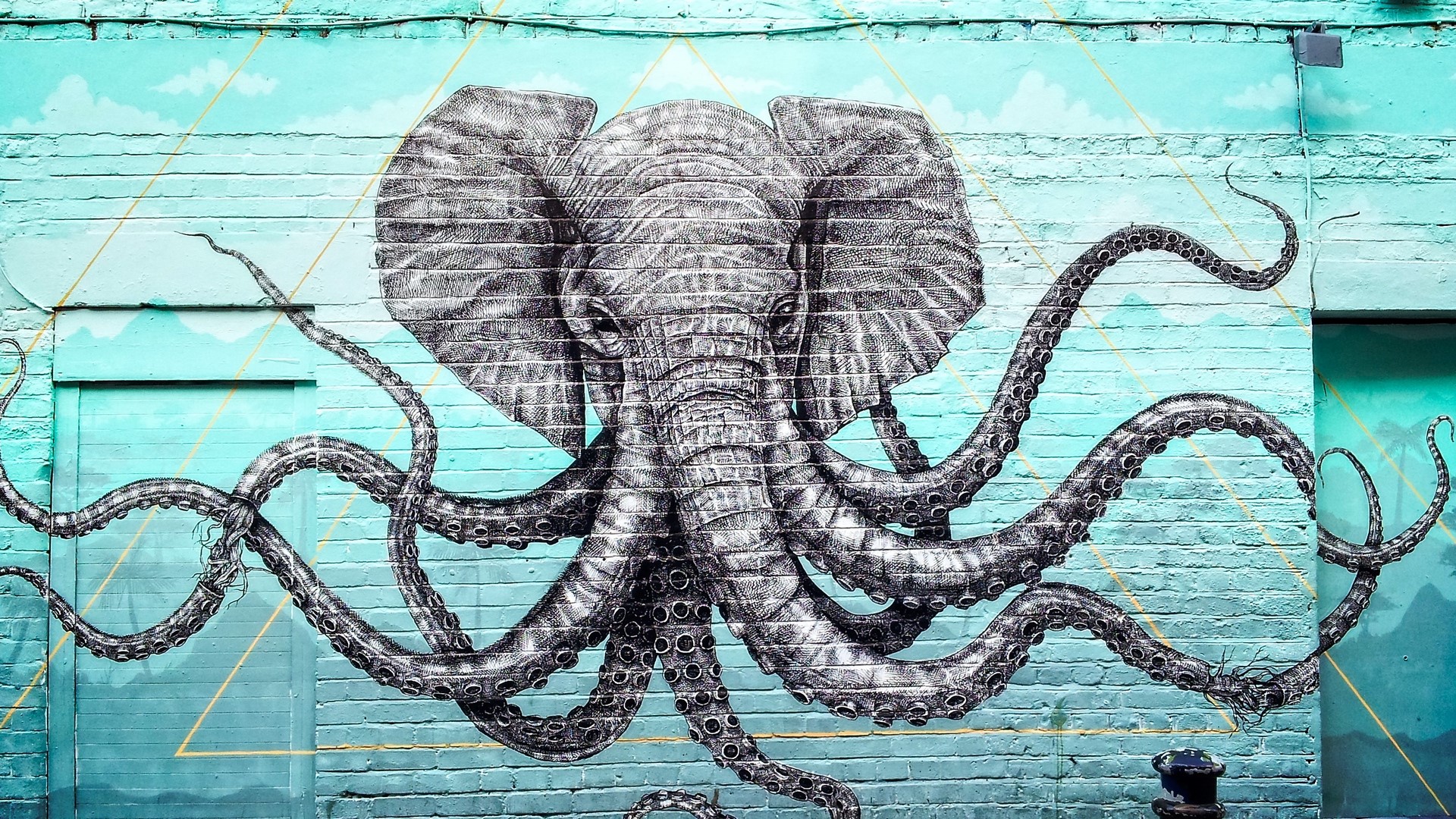 Elephant-octopus mural on turquoise brick wall HD Wallpaper