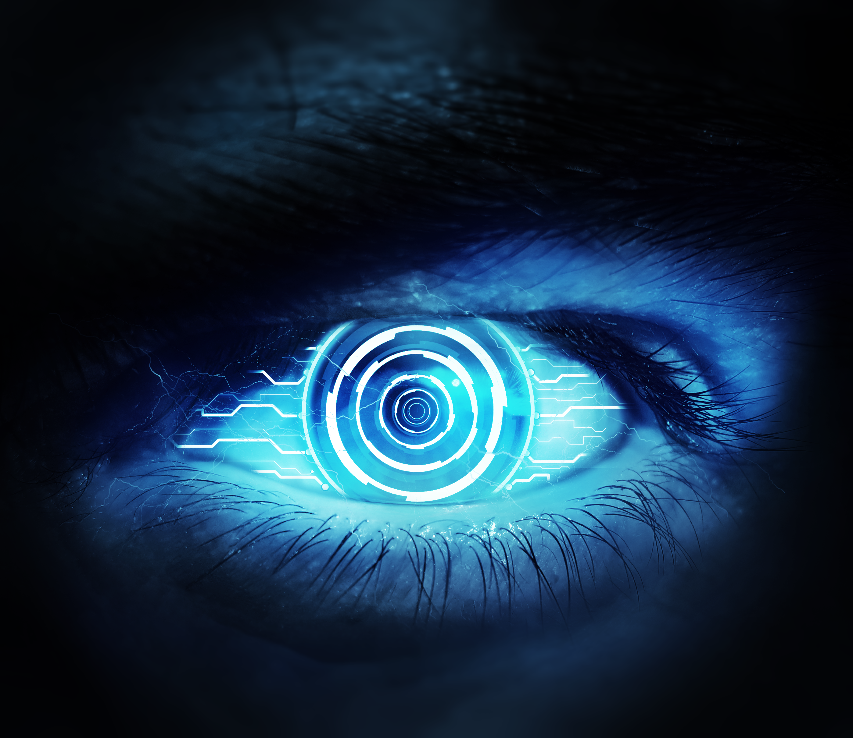 Close-up of a futuristic cybernetic eye with glowing blue circuits HD Wallpaper