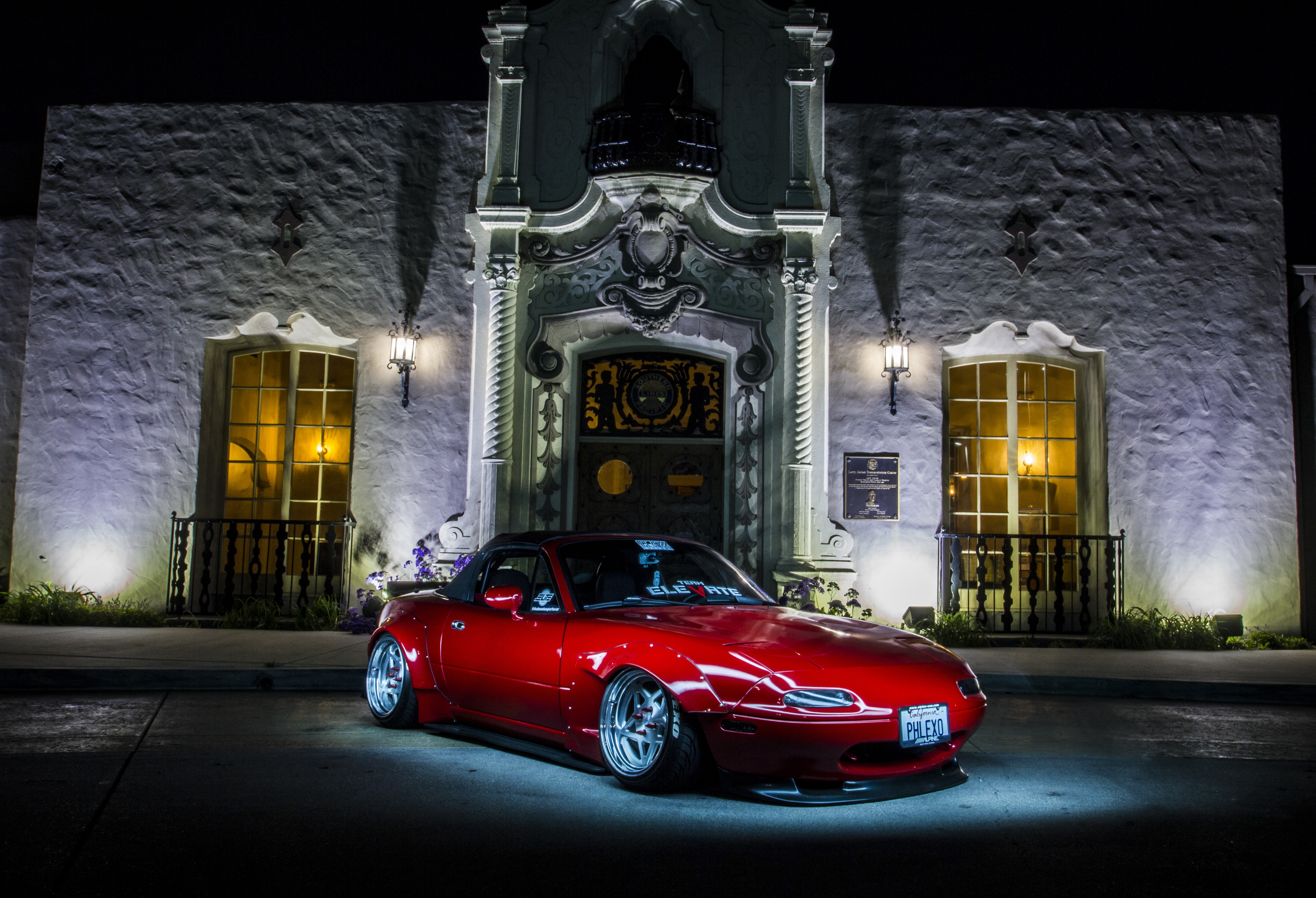 Red widebody Mazda MX-5 with pop-up headlights HD Wallpaper