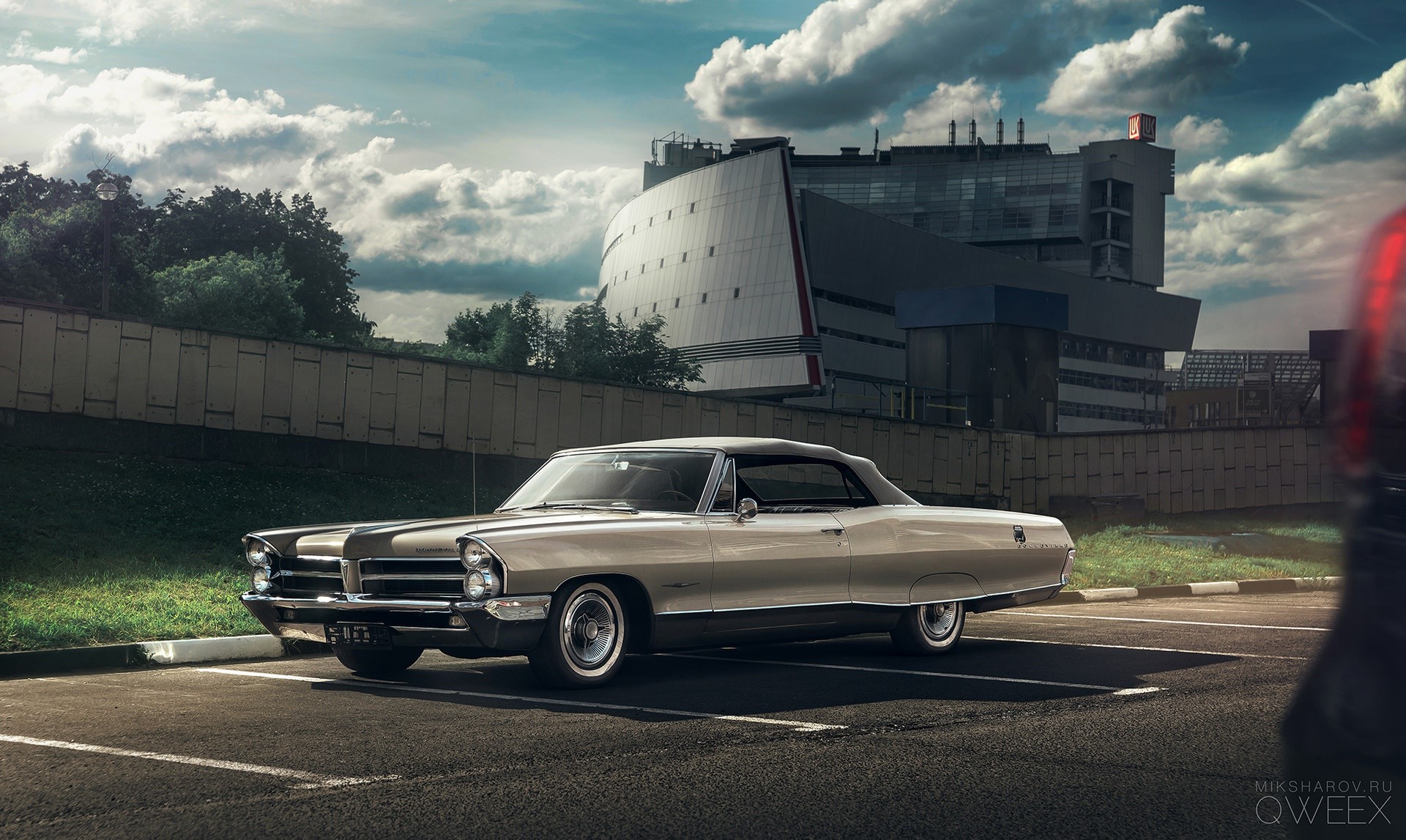 1960s Pontiac convertible parked in a lot HD Wallpaper