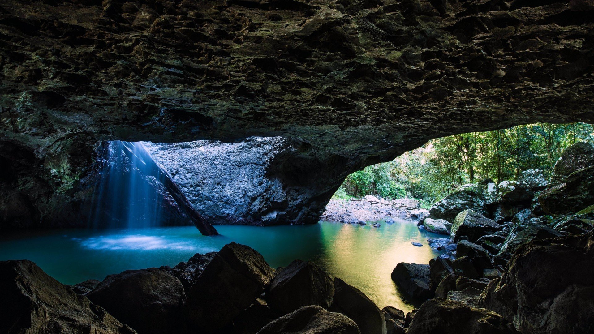 Cave with waterfall and turquoise water HD Wallpaper