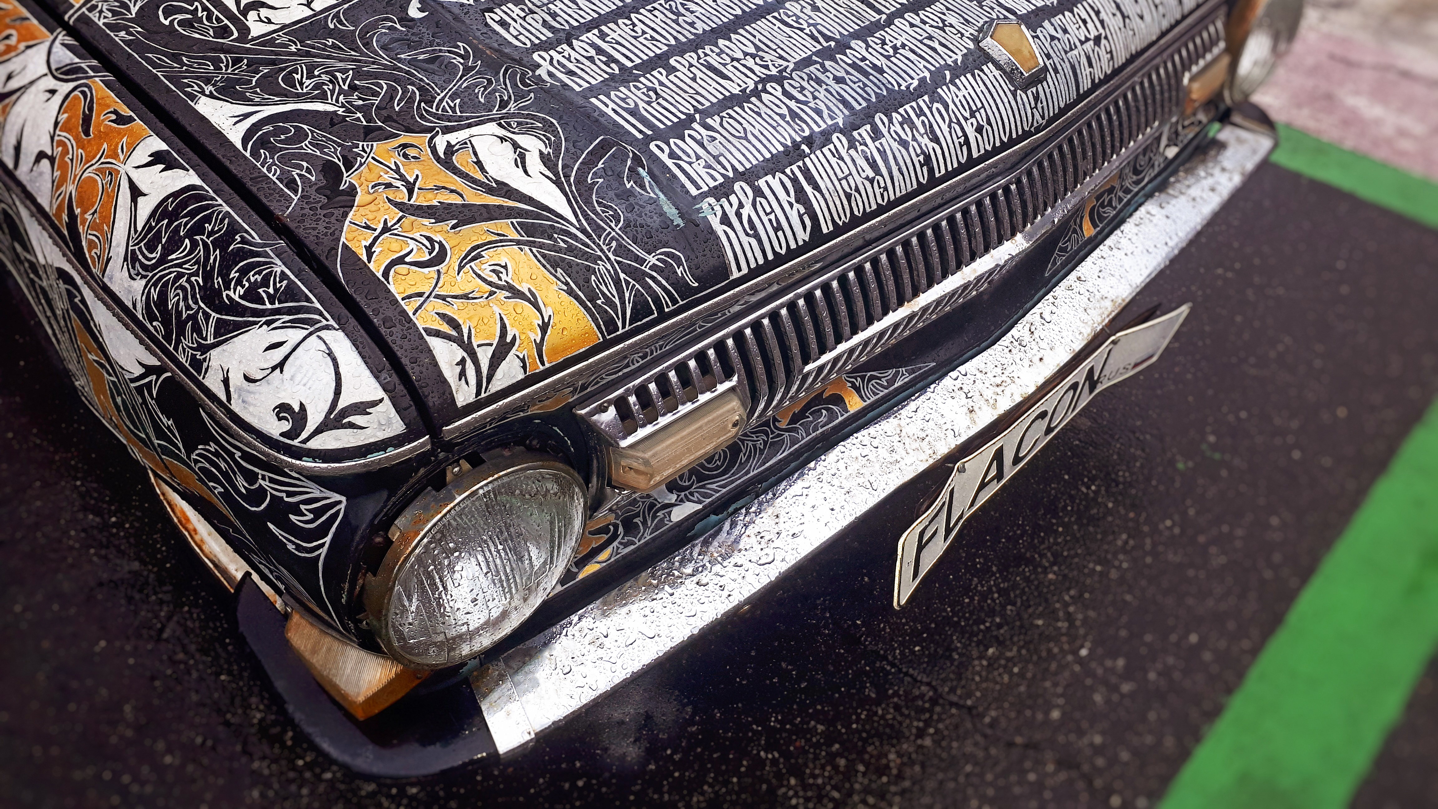 4K calligraphy on a ZAZ car with water drops HD Wallpaper