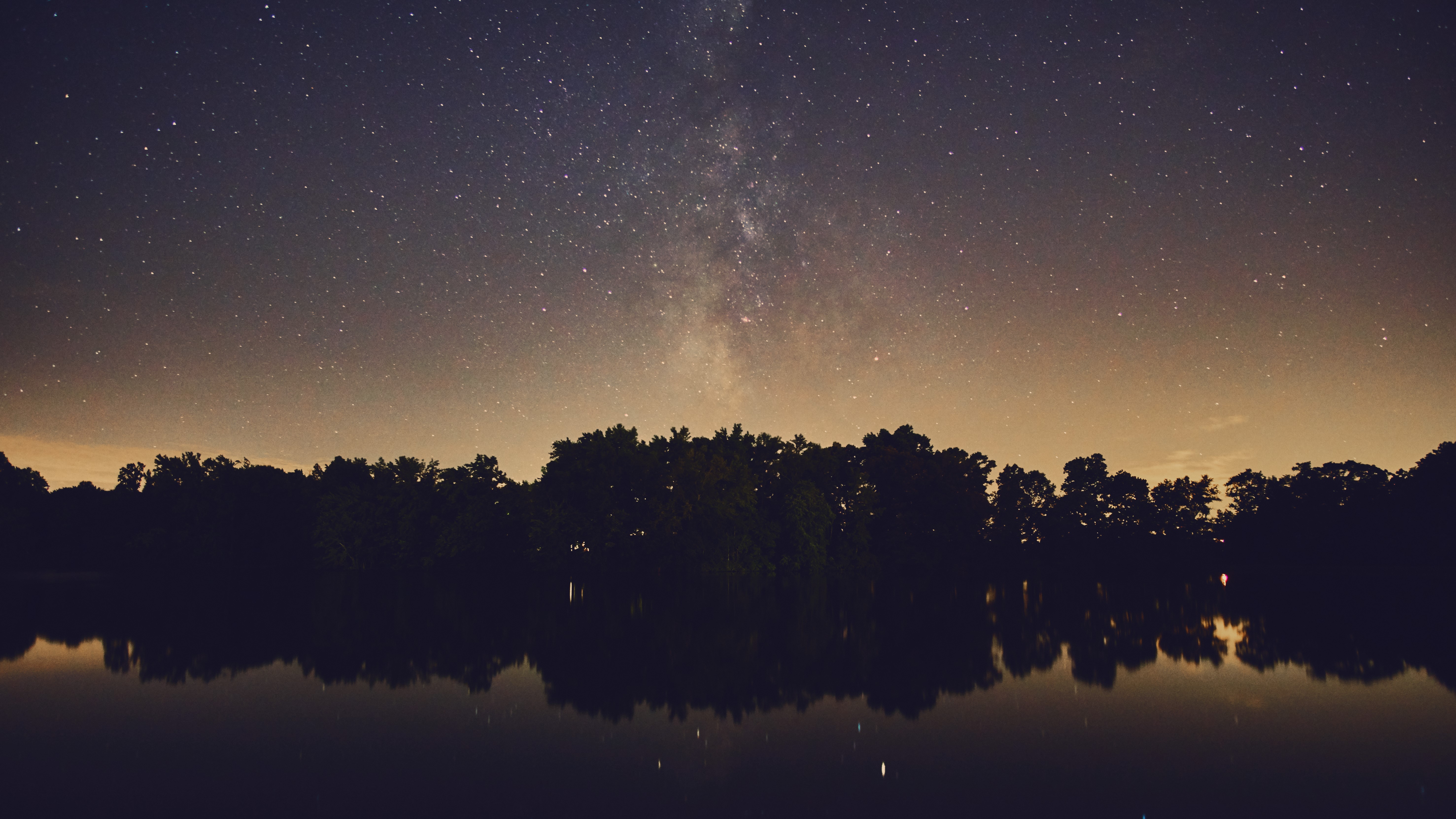 4K Milky Way over a lake and trees HD Wallpaper