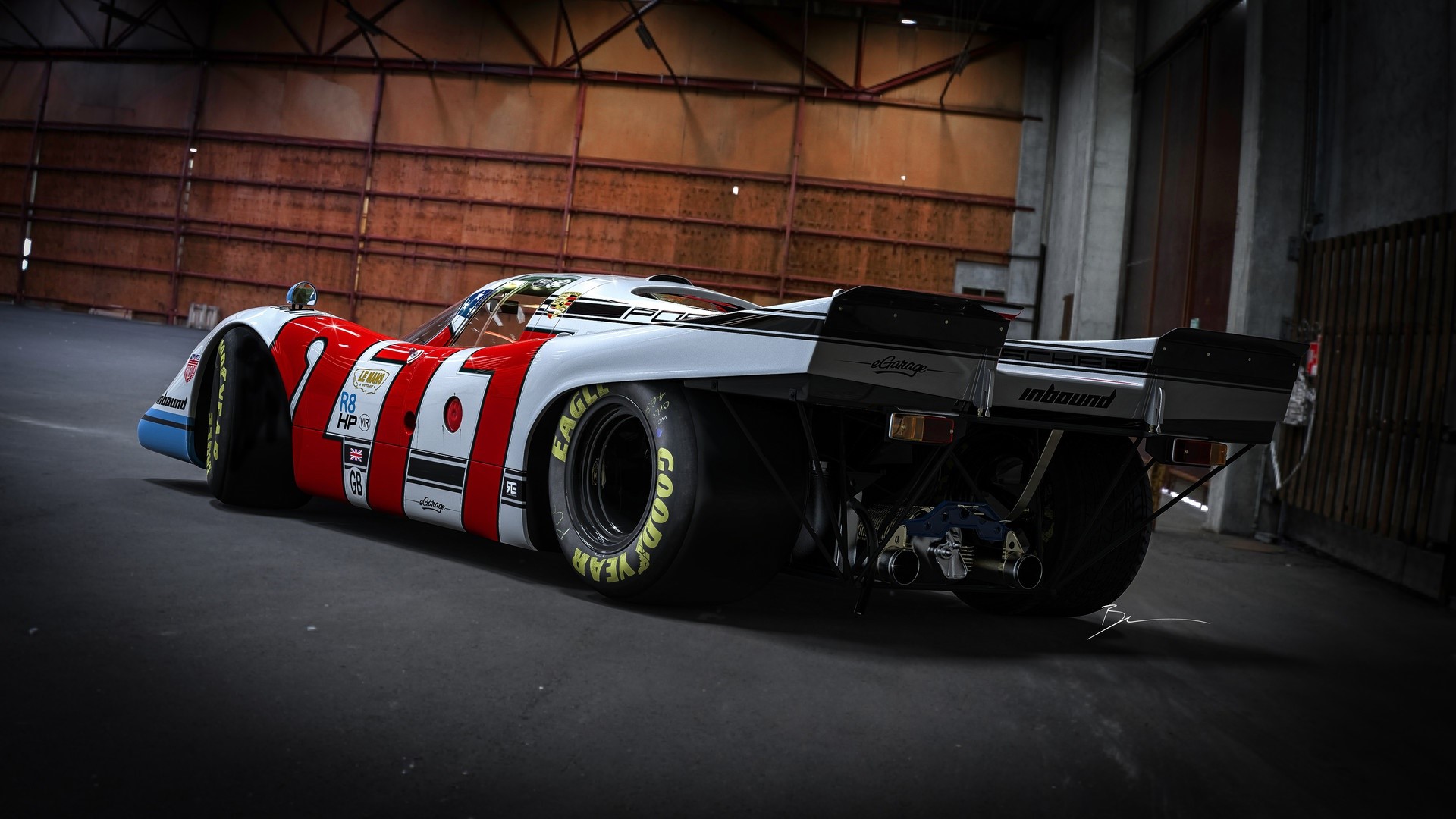 Porsche 917 race car in a garage HD Wallpaper