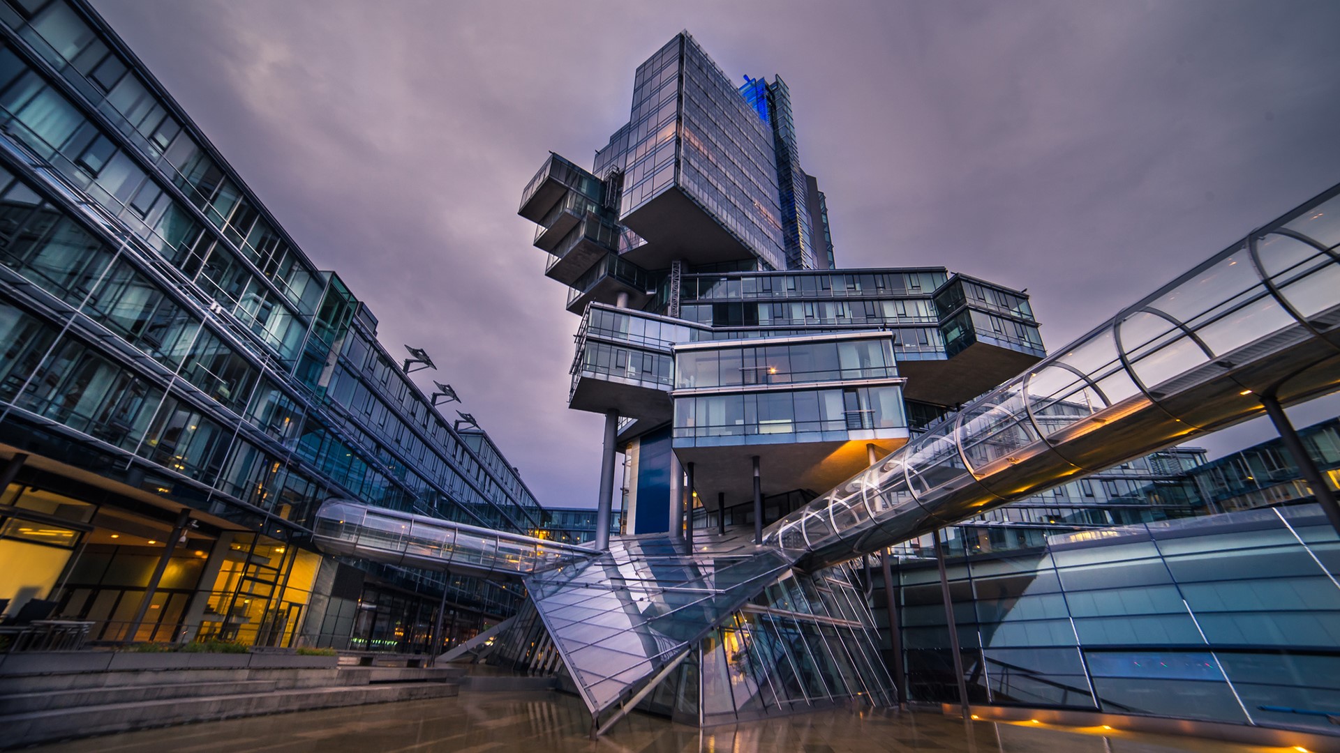 Modern glass buildings and skywalks in Hanover, Germany HD Wallpaper