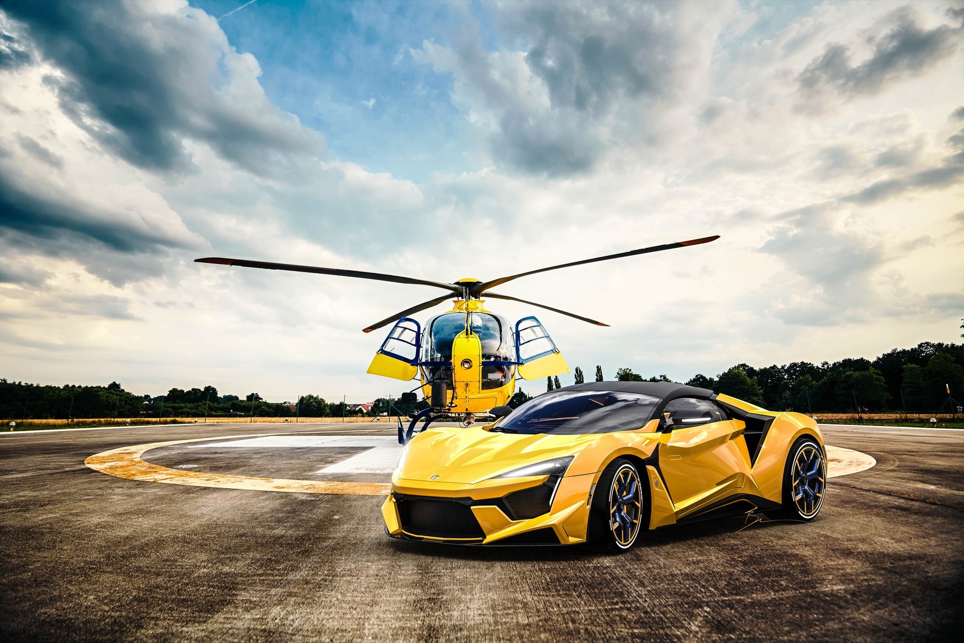 Yellow Fenyr Supersport car and helicopter on helipad HD Wallpaper